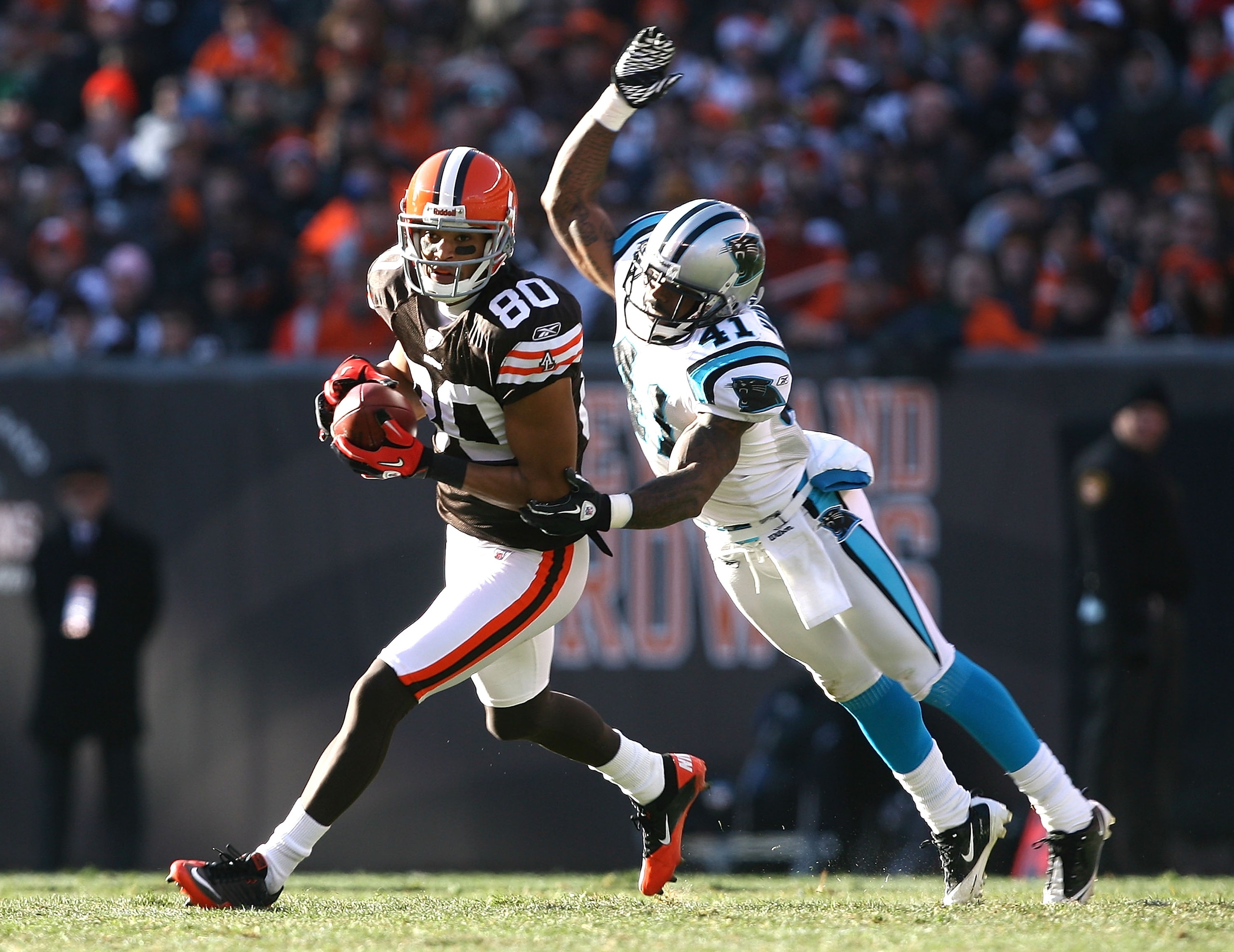CLEVELAND - NOVEMBER 28: Wide receiver Brian Robiskie #80 of the Cleveland Browns catches a pass in front of cornerback Captain Munnerlyn #41 of the Carolina Panthers at Cleveland Browns Stadium on November 28, 2010 in Cleveland, Ohio. (Photo by Matt Su CLEVELAND - NOVEMBER 28: Wide receiver Brian Robiskie #80 of the Cleveland Browns catches a pass in front of cornerback Captain Munnerlyn #41 of the Carolina Panthers at Cleveland Browns Stadium on November 28, 2010 in Cleveland, Ohio. (Photo by Matt Su
