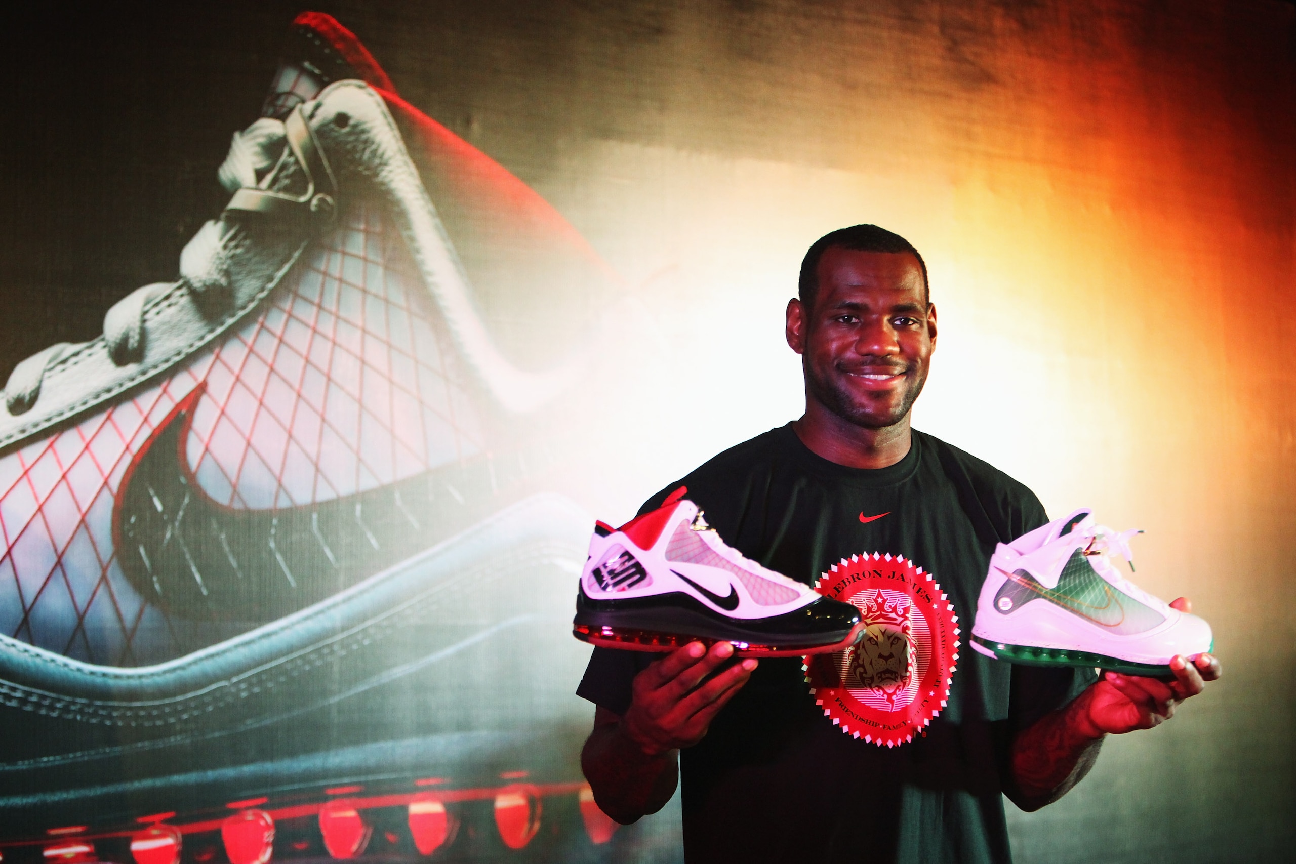 BEIJING - AUGUST 24:  LeBron James of the Cleveland Cavaliers shows the new Nike shoes in a promotional event during a visit to China on August 24, 2009 in Beijing, China.  (Photo by Feng Li/Getty Images)