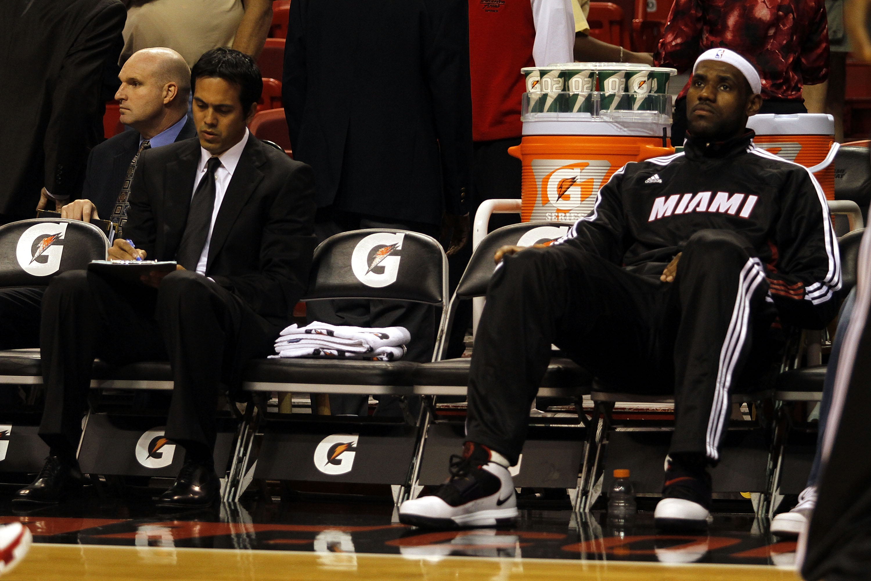 MIAMI - OCTOBER 12:  Forward LeBron James #6 and head coach Erik Spoelstra of the Miami Heat on the bench during a game against CSKA Moskow on October 12, 2010 in Miami, Florida.  NOTE TO USER: User expressly acknowledges and agrees that, by downloading a
