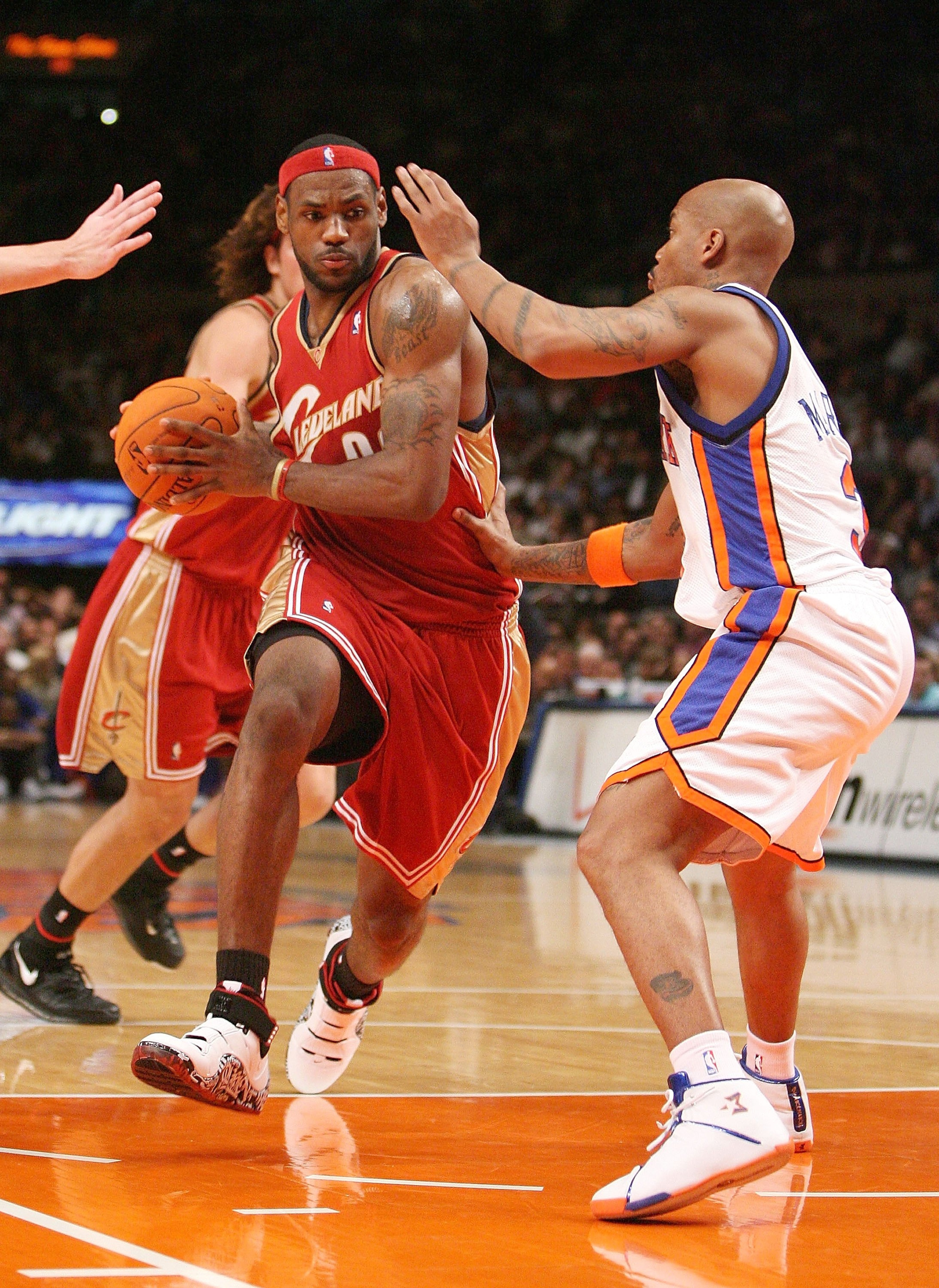 NEW YORK - NOVEMBER 13: LeBron James #23 of the Cleveland Cavaliers charges past Stephon Marbury #3 of the New York Knicks on November 13, 2006 at Madison Square Garden in New York City. NOTE TO USER: User expressly acknowledges and agrees that, by down NEW YORK - NOVEMBER 13: LeBron James #23 of the Cleveland Cavaliers charges past Stephon Marbury #3 of the New York Knicks on November 13, 2006 at Madison Square Garden in New York City. NOTE TO USER: User expressly acknowledges and agrees that, by down