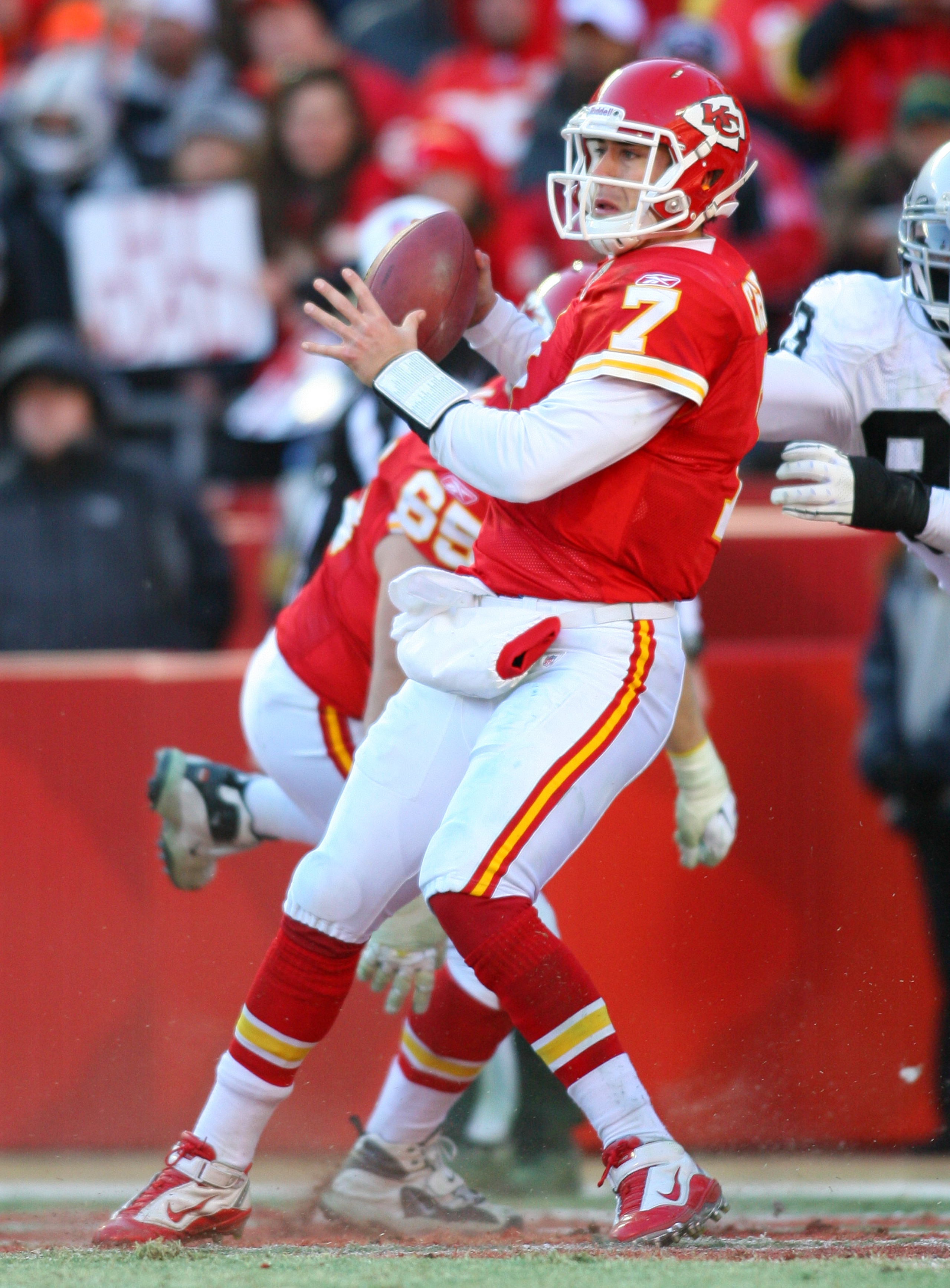KANSAS CITY, MO - JANUARY 02: Quarterback Matt Cassel #7 of the Kansas City Chiefs is hit as he throws by defensive tackle Tommy Kelly #93 of the Oakland Raiders in a game at Arrowhead Stadium on January 2, 2011 in Kansas City, Missouri. (Photo by Tim U KANSAS CITY, MO - JANUARY 02: Quarterback Matt Cassel #7 of the Kansas City Chiefs is hit as he throws by defensive tackle Tommy Kelly #93 of the Oakland Raiders in a game at Arrowhead Stadium on January 2, 2011 in Kansas City, Missouri. (Photo by Tim U