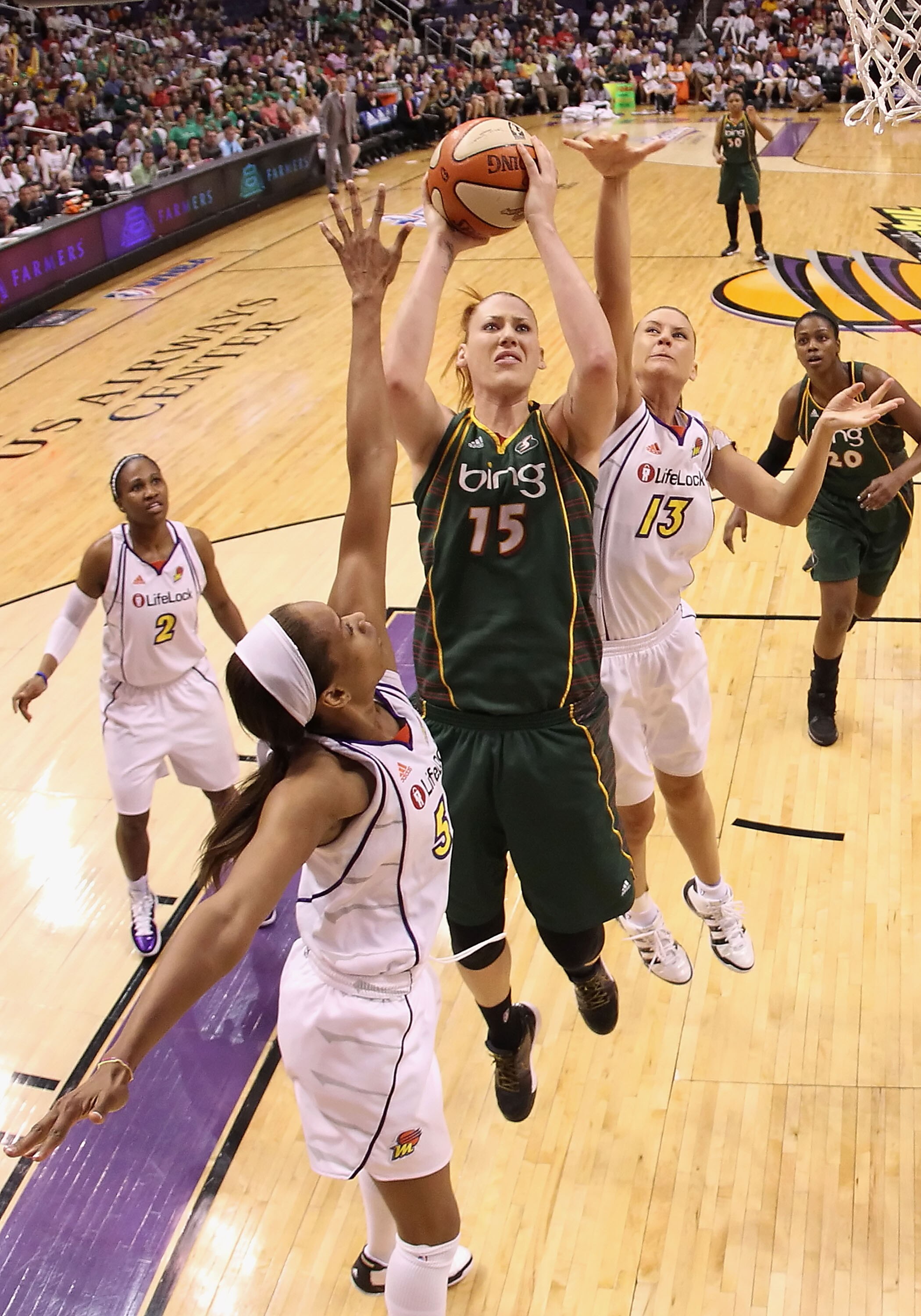 PHOENIX - SEPTEMBER 05:  Lauren Jackson #!5 of the Seattle Storm puts up a shot under pressure from Tangela Smith #50 and Penny Taylor #13 of the Phoenix Mercury in Game Two of the Western Conference Finals during the 2010 WNBA Playoffs at US Airways Cent
