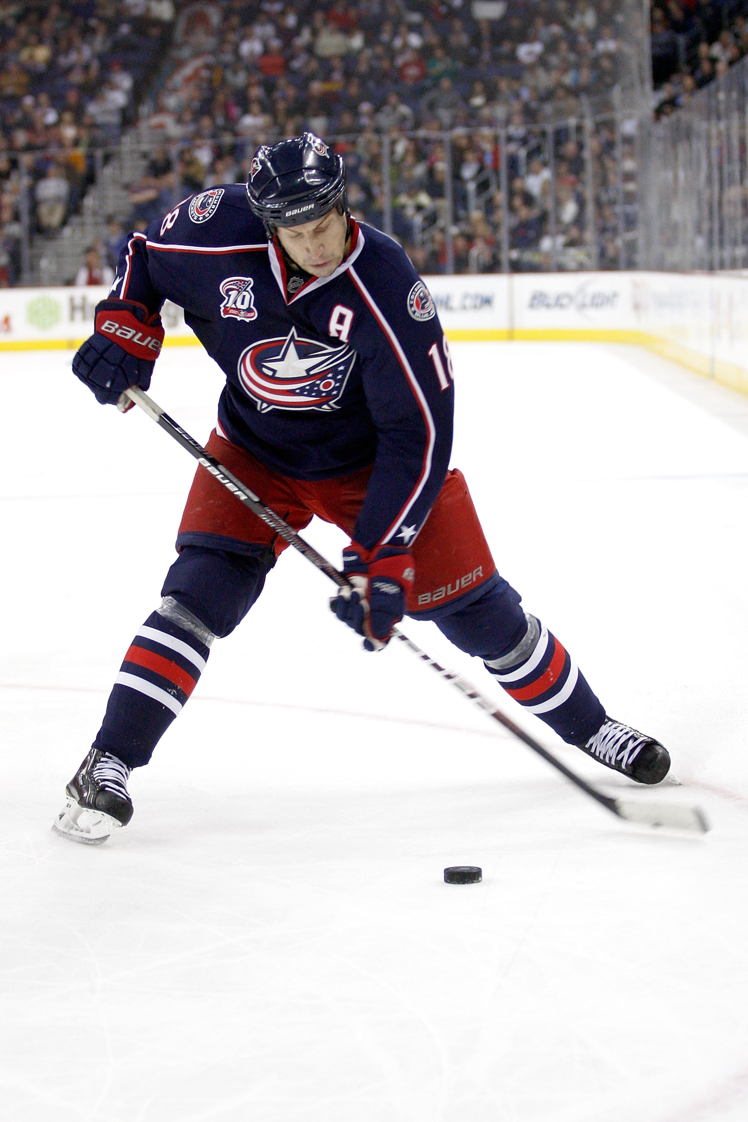 COLUMBUS, OH - DECEMBER 21: R.J. Umberger #18 of the Columbus Blue Jackets shoots the puck during a game against the Calgary Flames on December 21, 2010 at Nationwide Arena in Columbus, Ohio. (Photo by John Grieshop/Getty Images) COLUMBUS, OH - DECEMBER 21: R.J. Umberger #18 of the Columbus Blue Jackets shoots the puck during a game against the Calgary Flames on December 21, 2010 at Nationwide Arena in Columbus, Ohio. (Photo by John Grieshop/Getty Images)