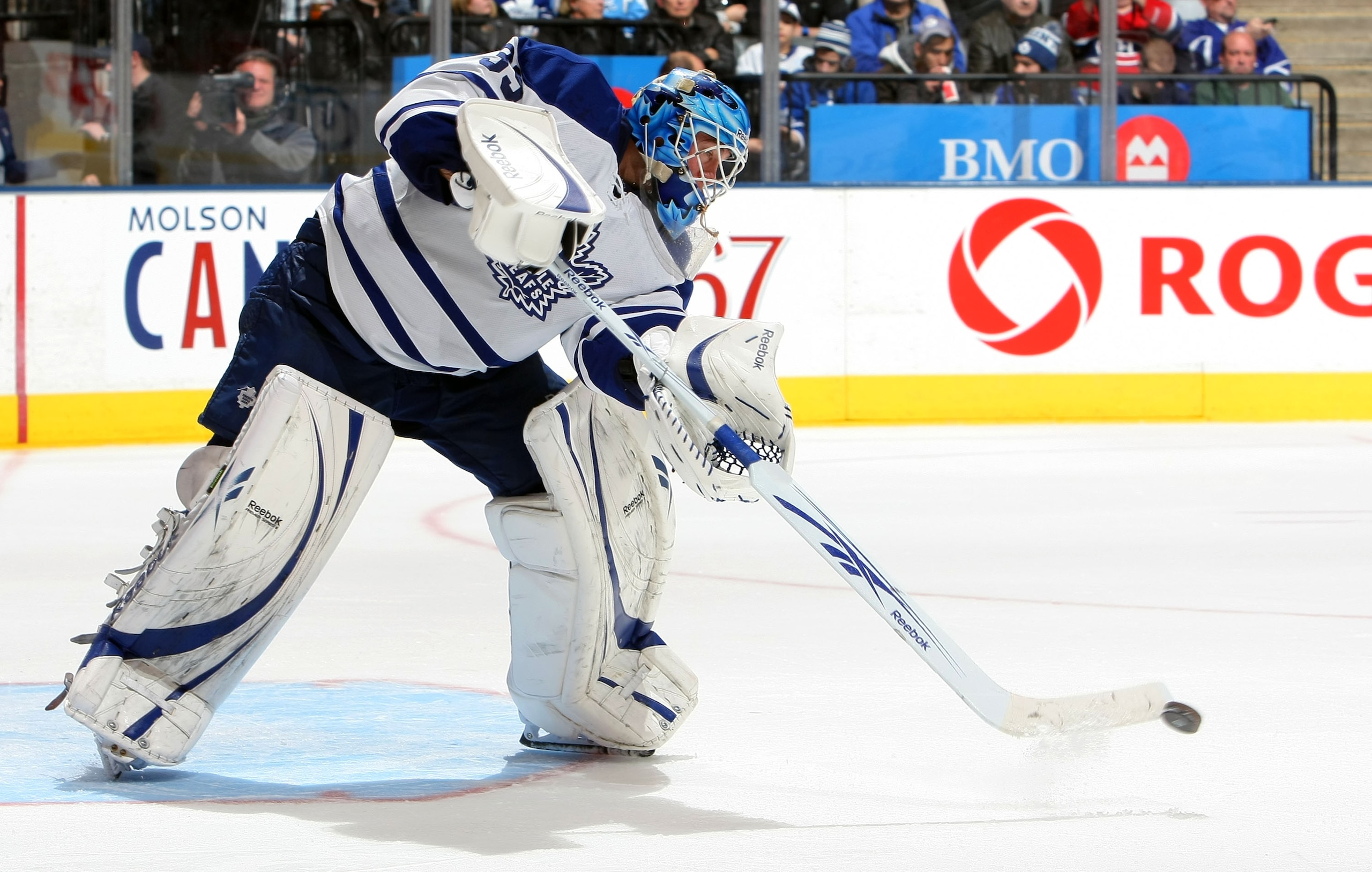 TORONTO - DECEMBER 11: Jean-Sebastien Giguere #35 of the Toronto Maple Leafs clears the puck against the Montreal Canadiens during their NHL game at Air Canada Centre on December 11, 2010 in Toronto, Ontario, Canada.(Photo By Dave Sandford/Getty Images) TORONTO - DECEMBER 11: Jean-Sebastien Giguere #35 of the Toronto Maple Leafs clears the puck against the Montreal Canadiens during their NHL game at Air Canada Centre on December 11, 2010 in Toronto, Ontario, Canada.(Photo By Dave Sandford/Getty Images)