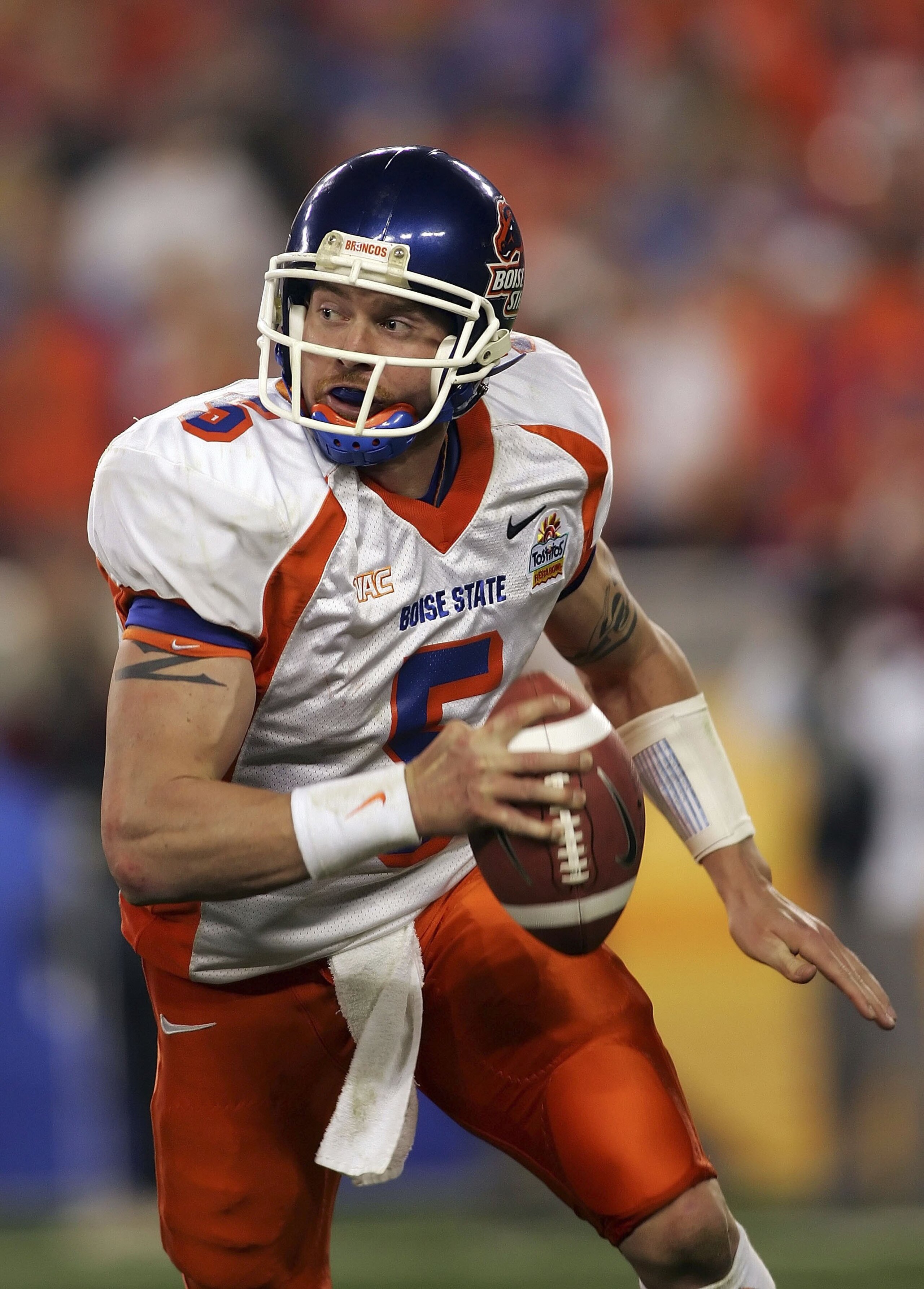 GLENDALE, AZ - JANUARY 1:  Quarterback Jared Zabransky #5 of the Boise State Broncos scrambles in the third quarter against the Oklahoma Sooners at the Tostito's Fiesta Bowl against the Boise State Broncos at University of Phoenix Stadium January 1, 2007