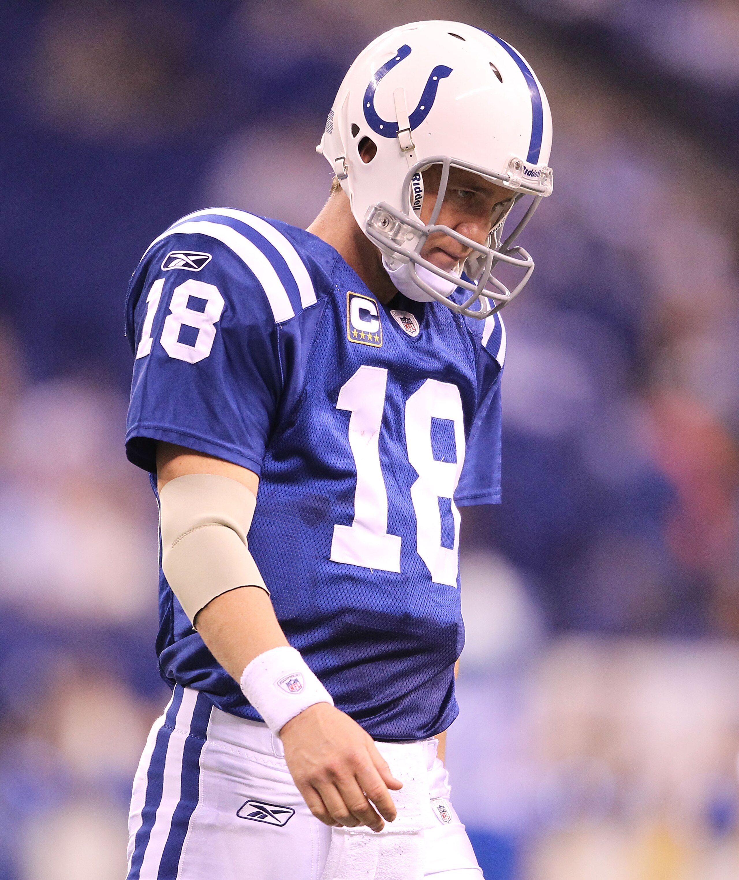 INDIANAPOLIS - NOVEMBER 28:  Peyton Manning #18 of the Indianapolis Colts walks off of the field after throwing an interception during the NFL game against the San Diego Chargers at Lucas Oil Stadium on November 28, 2010 in Indianapolis, Indiana. The Char