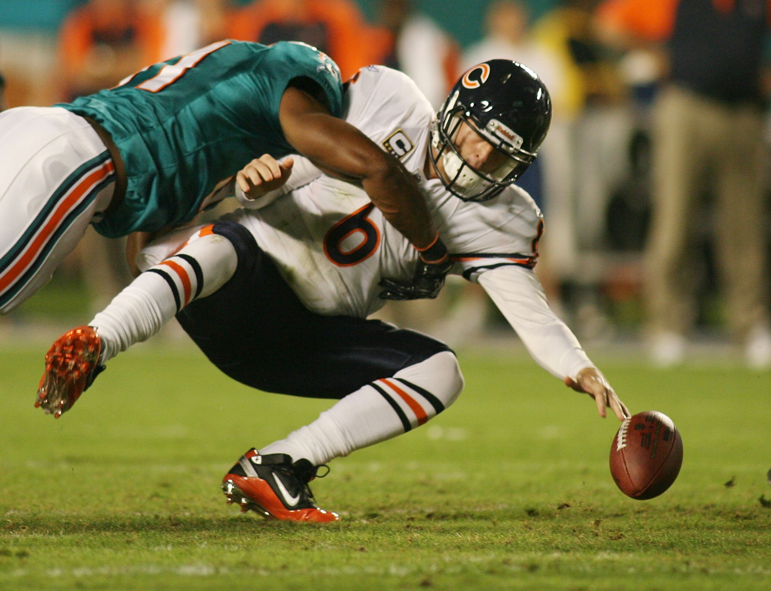 MIAMI - NOVEMBER 18: Quarterback Jay Cutler #6 of the Chicago Bears is sacked by linebacker Cameron wake #91 of the Miami Dolphins and fumbles at Sun Life Stadium on November 18, 2010 in Miami, Florida. (Photo by Marc Serota/Getty Images) MIAMI - NOVEMBER 18: Quarterback Jay Cutler #6 of the Chicago Bears is sacked by linebacker Cameron wake #91 of the Miami Dolphins and fumbles at Sun Life Stadium on November 18, 2010 in Miami, Florida. (Photo by Marc Serota/Getty Images)
