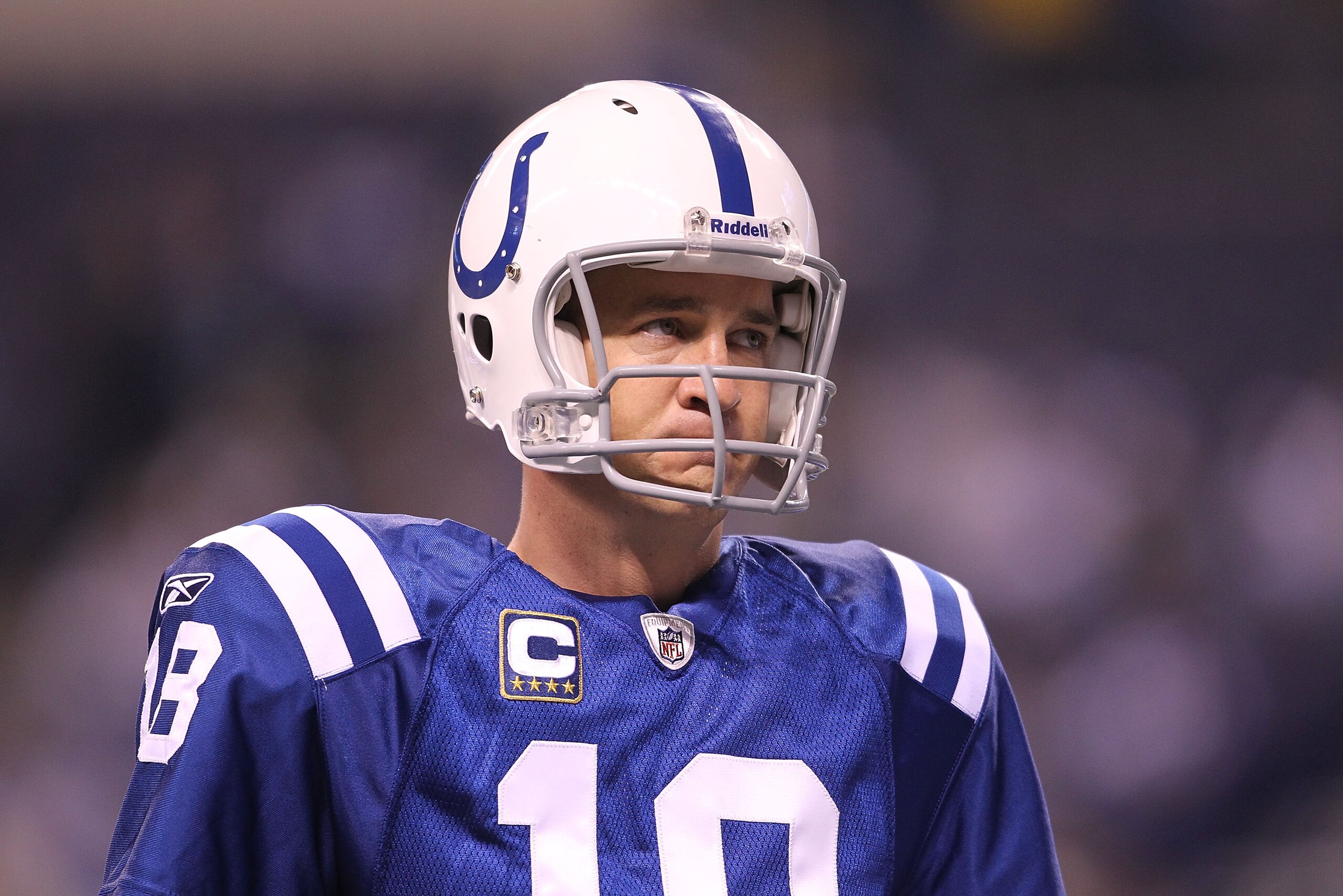 INDIANAPOLIS - NOVEMBER 28:  Peyton Manning #18 of the Indianapolis Colts watches his teammates before the NFL game against the San Diego Chargers at Lucas Oil Stadium on November 28, 2010 in Indianapolis, Indiana.  (Photo by Andy Lyons/Getty Images)