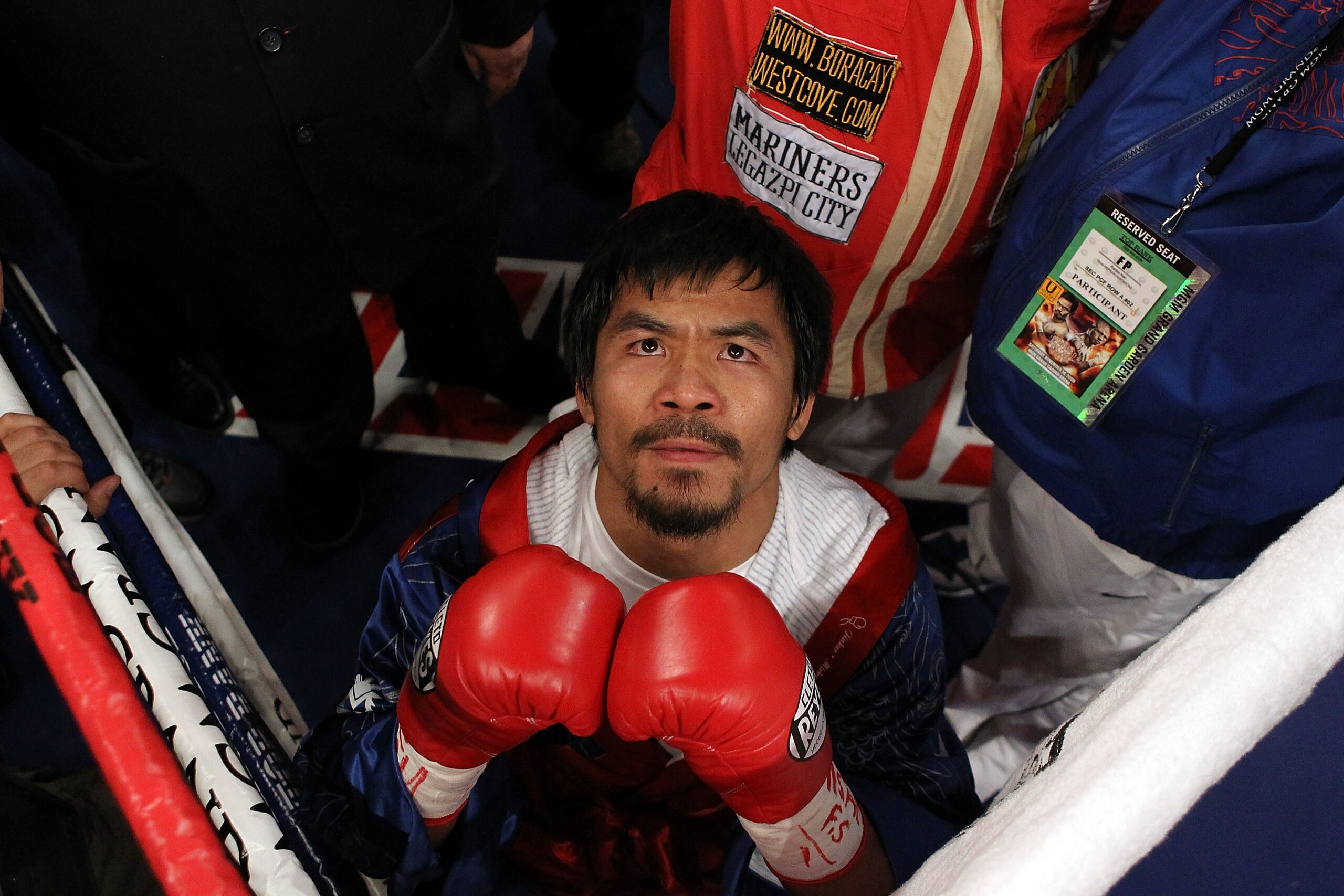 LAS VEGAS - NOVEMBER 14:  Manny Pacquiao prays in the ring before taking on Miguel Cotto during their WBO welterweight title fight at the MGM Grand Garden Arena on November 14, 2009 in Las Vegas, Nevada.  (Photo by Al Bello/Getty Images)