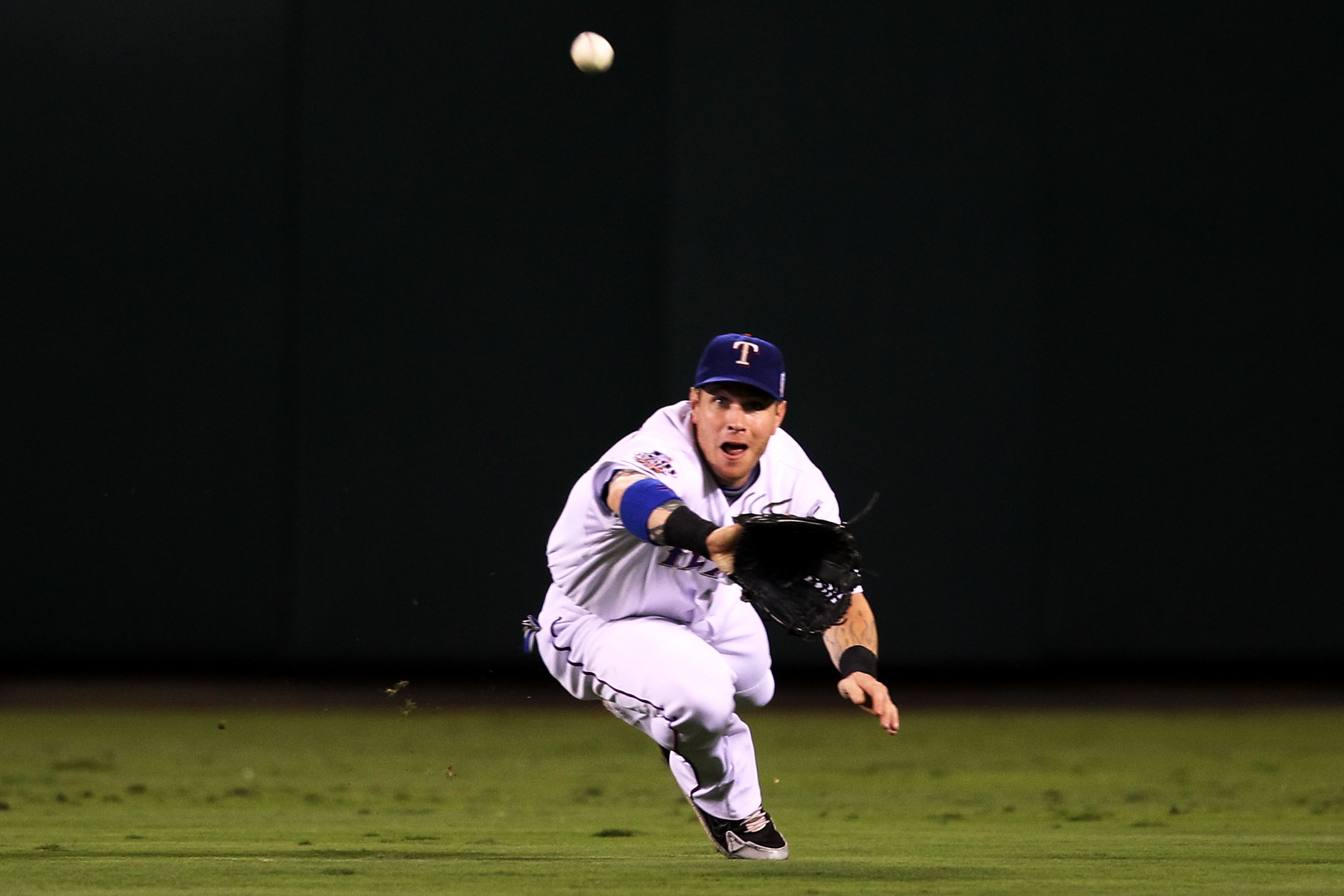 ARLINGTON, TX - OCTOBER 31:  Josh Hamilton #32 of the Texas Rangers makes a diving catch in the second inning against the San Francisco Giants in Game Four of the 2010 MLB World Series at Rangers Ballpark in Arlington on October 31, 2010 in Arlington, Tex