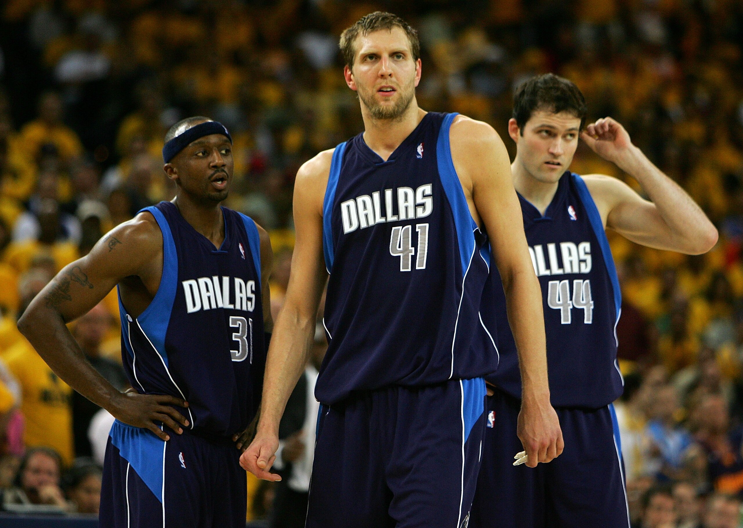 OAKLAND, CA - MAY 03: Dirk Nowitizki #41, Jason Terry #31 and Austin Croshere #44 of the Dallas Mavericks look on against the Golden State Warriors in Game 6 of the Western Conference Quarterfinals during the 2007 NBA Playoffs on May 3, 2007 at Oracle Ar OAKLAND, CA - MAY 03: Dirk Nowitizki #41, Jason Terry #31 and Austin Croshere #44 of the Dallas Mavericks look on against the Golden State Warriors in Game 6 of the Western Conference Quarterfinals during the 2007 NBA Playoffs on May 3, 2007 at Oracle Ar