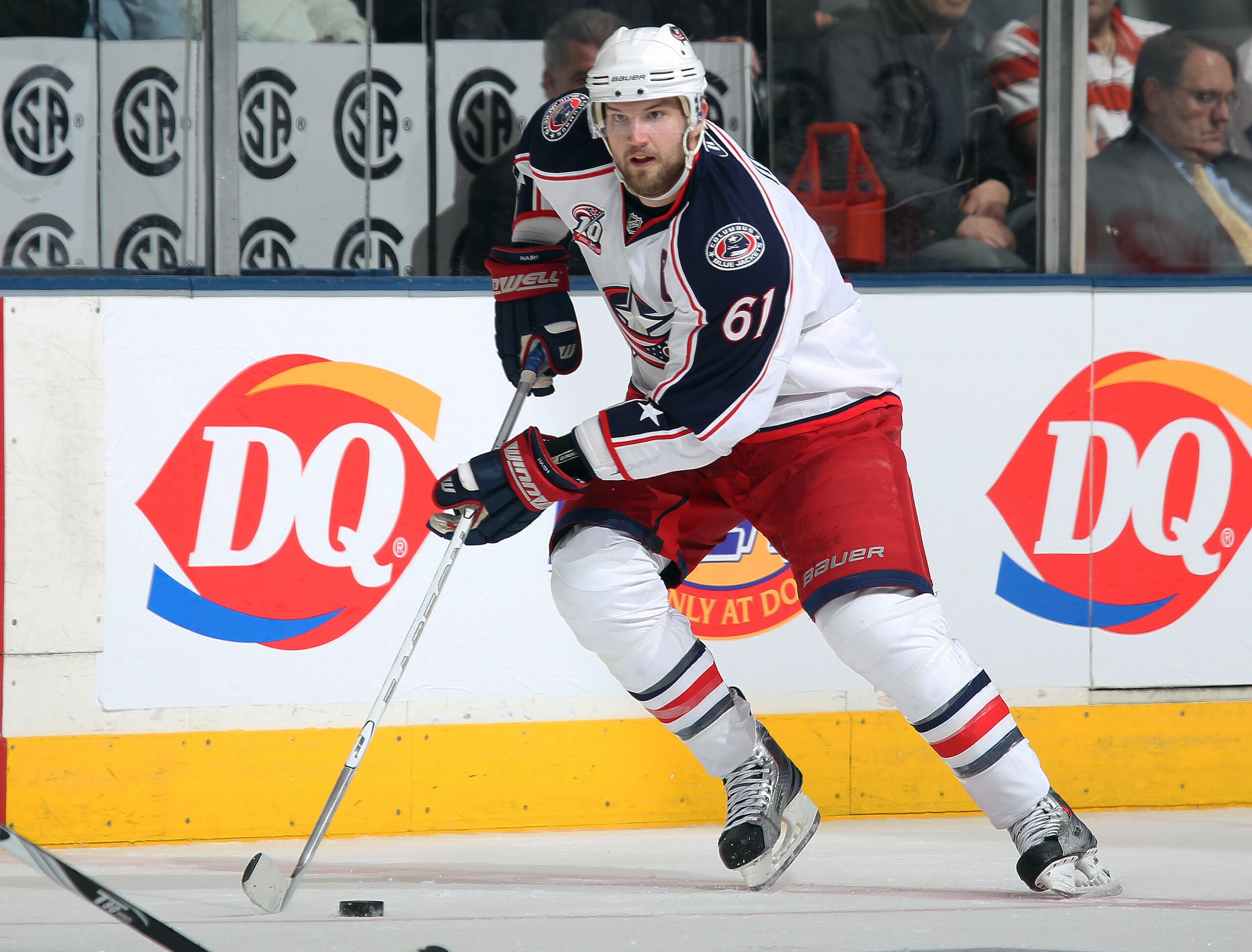 TORONTO, CANADA - DECEMBER 30:  Rick Nash #61 of the Columbus Blue Jackets skates up ice with the puck in a game against the Toronto Maple Leafs on December 30, 2010 at the Air Canada Centre in Toronto, Canada. The Blue Jackets defeated the Leafs 3-2. (Ph