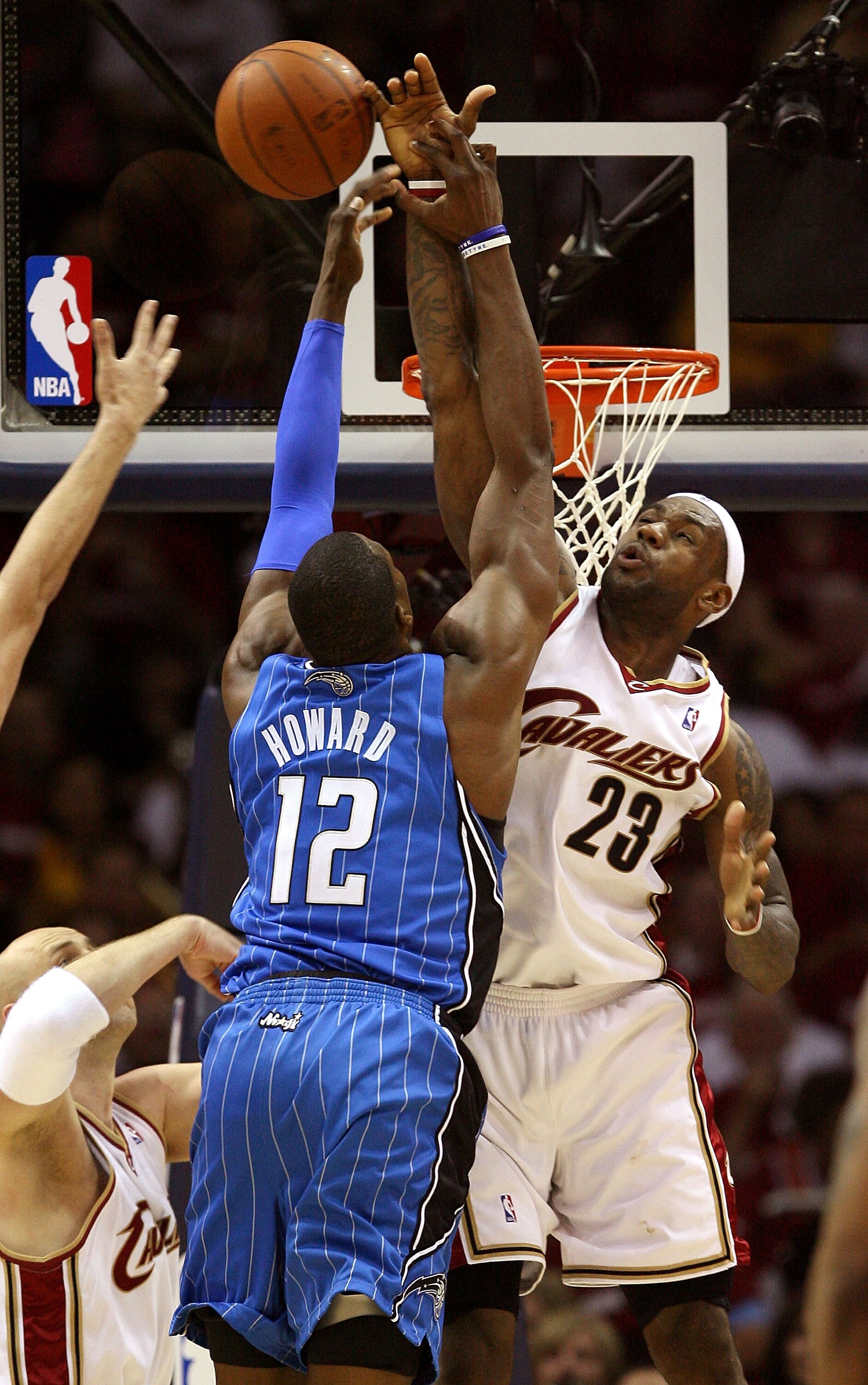 CLEVELAND - MAY 20: LeBron James #23 of the Cleveland Cavaliers blocks the shot of Dwight Howard #12 of the Orlando Magic in Game One of the Eastern Conference Finals during the 2009 Playoffs at Quicken Loans Arena on May 20, 2009 in Cleveland, Ohio. NOTE