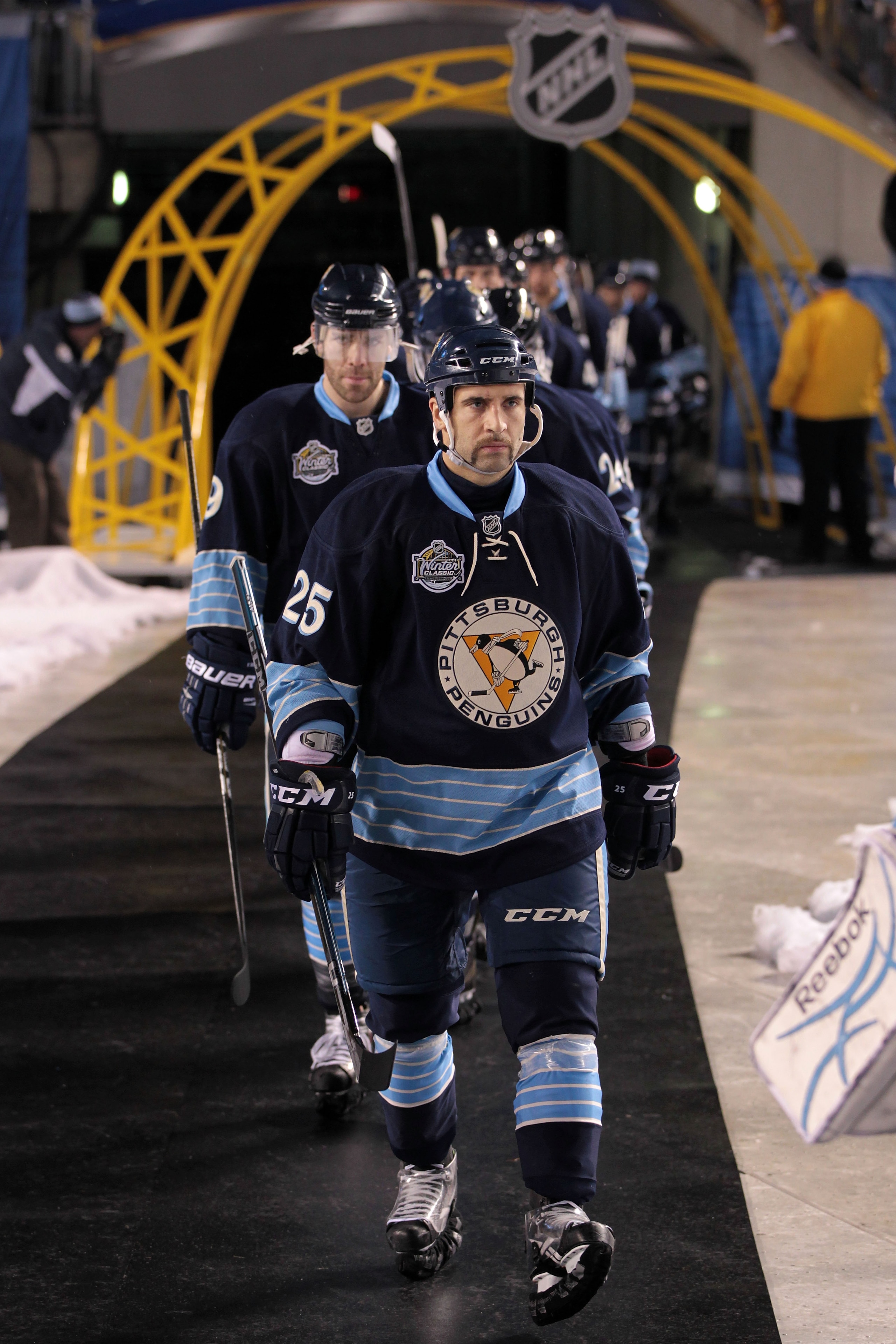 PITTSBURGH, PA - JANUARY 01: Maxime Talbot #25 of the Pittsburgh Penguins walks to the ice before playing against the Washington Capitals during the 2011 NHL Bridgestone Winter Classic at Heinz Field on January 1, 2011 in Pittsburgh, Pennsylvania. Washing