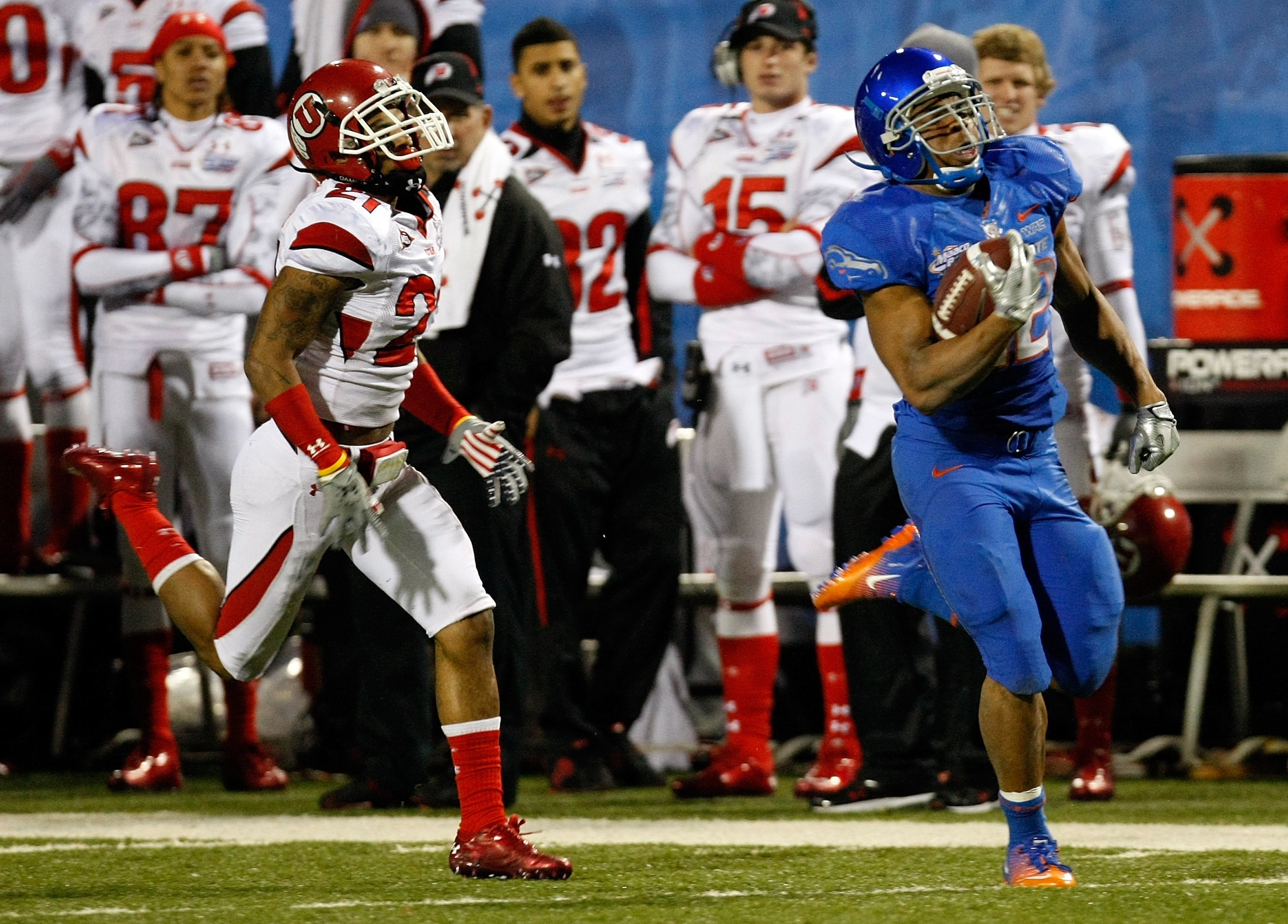 LAS VEGAS, NV - DECEMBER 22:  Doug Martin #22 of the Boise State Broncos runs for a touchdown as he gets away from Lamar Chapman #21 of the Utah Utes during the MAACO Bowl Las Vegas at Sam Boyd Stadium December 22, 2010 in Las Vegas, Nevada.  (Photo by Et