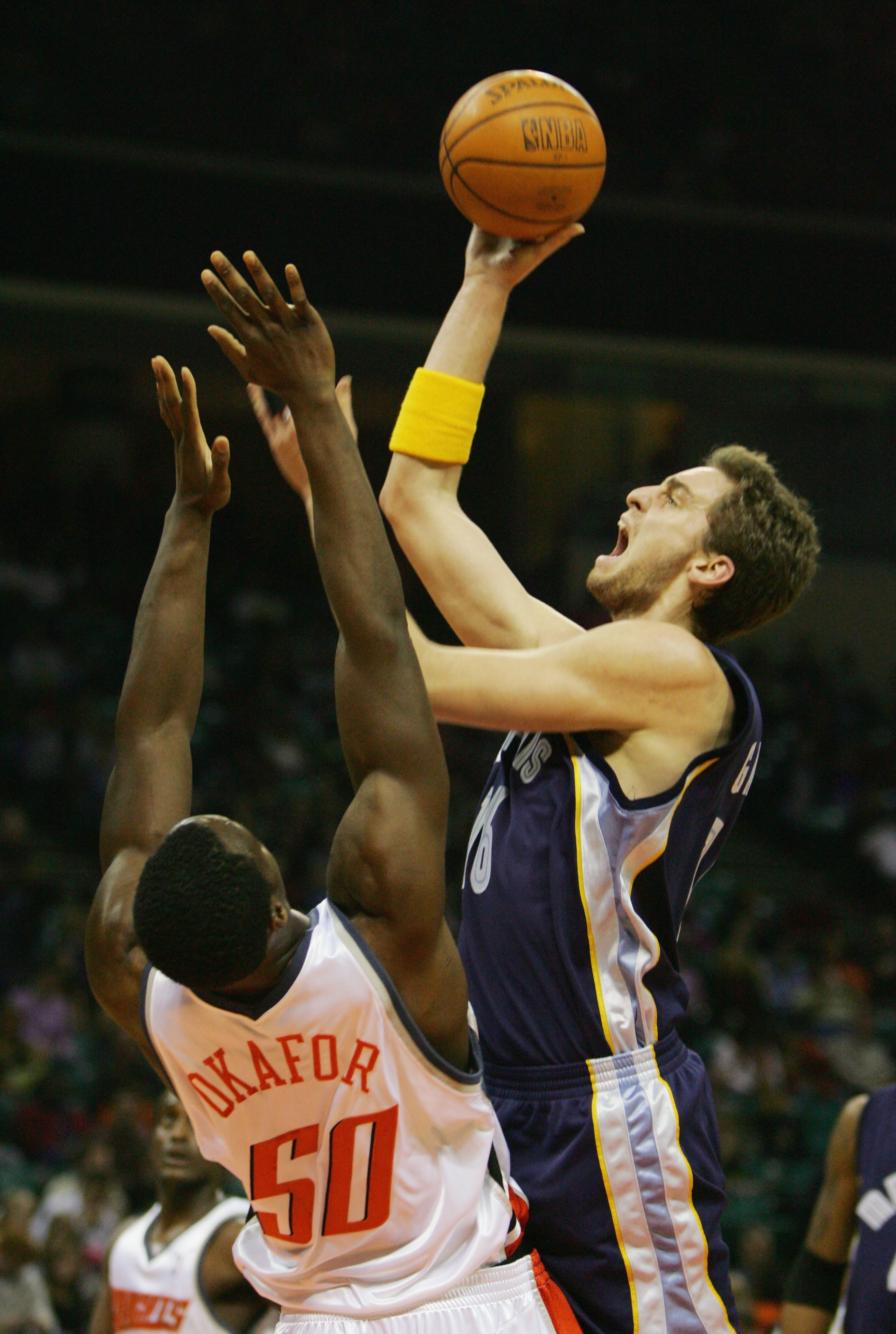 CHARLOTTE - JANUARY 14:   Pau Gasol #16 of the Memphis Grizzlies shoots over Emeka Okafo #50 of the Charlotte Bobcats during the game on January 14, 2005 at the Charlotte Coliseum in Charlotte, North Carolina. The Grizzlies defeated the Bobcats 109-89.  N