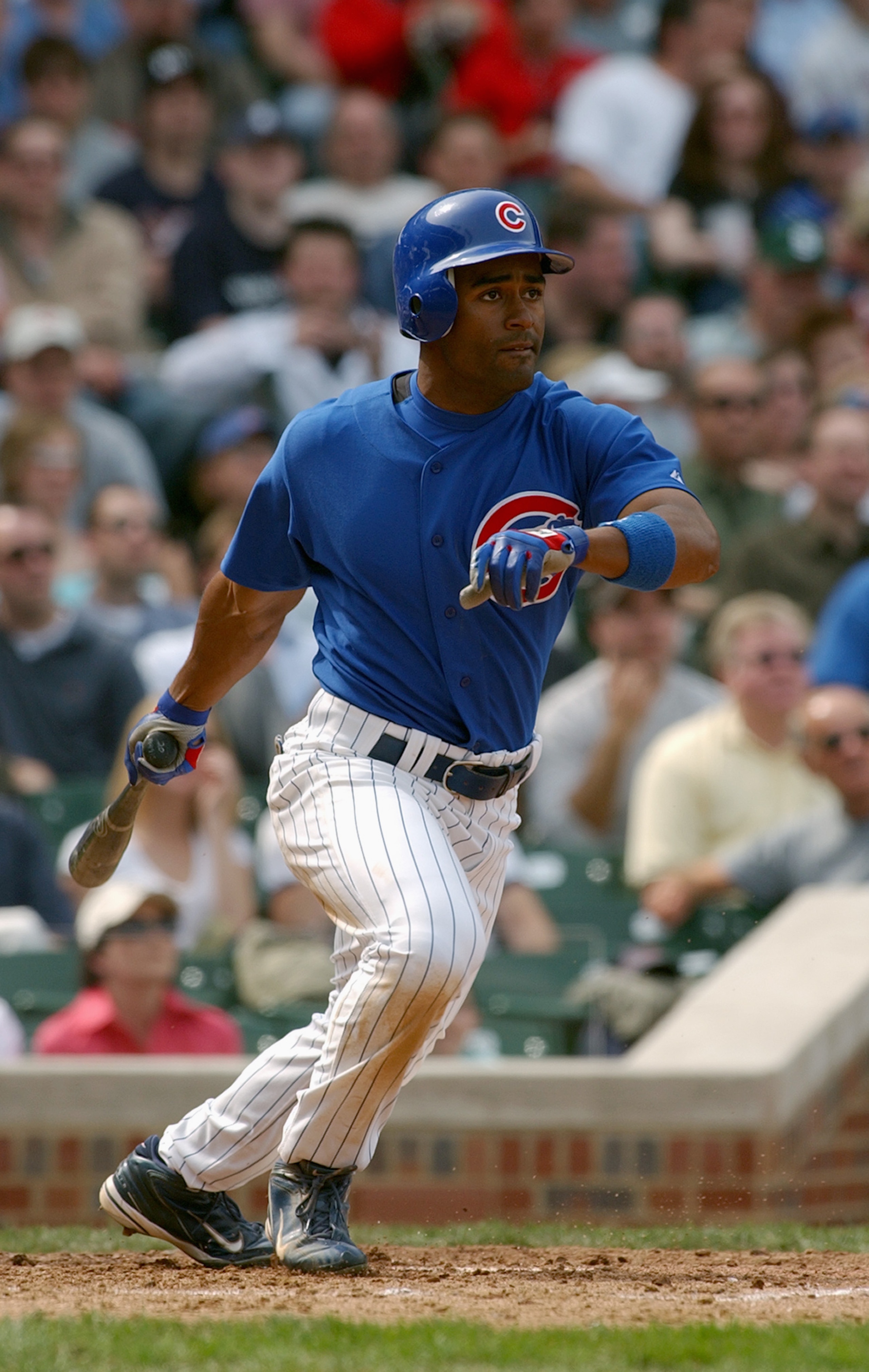 CHICAGO - APRIL 15:  Corey Patterson #20 of the Chicago Cubs bats during the game against the Pittsburgh Pirates on April 15, 2004 at Wrigley Field in Chicago, Illinois.  The Cubs defeated the Pirates 10-5.  (Photo by Jonathan Daniel/Getty Images)