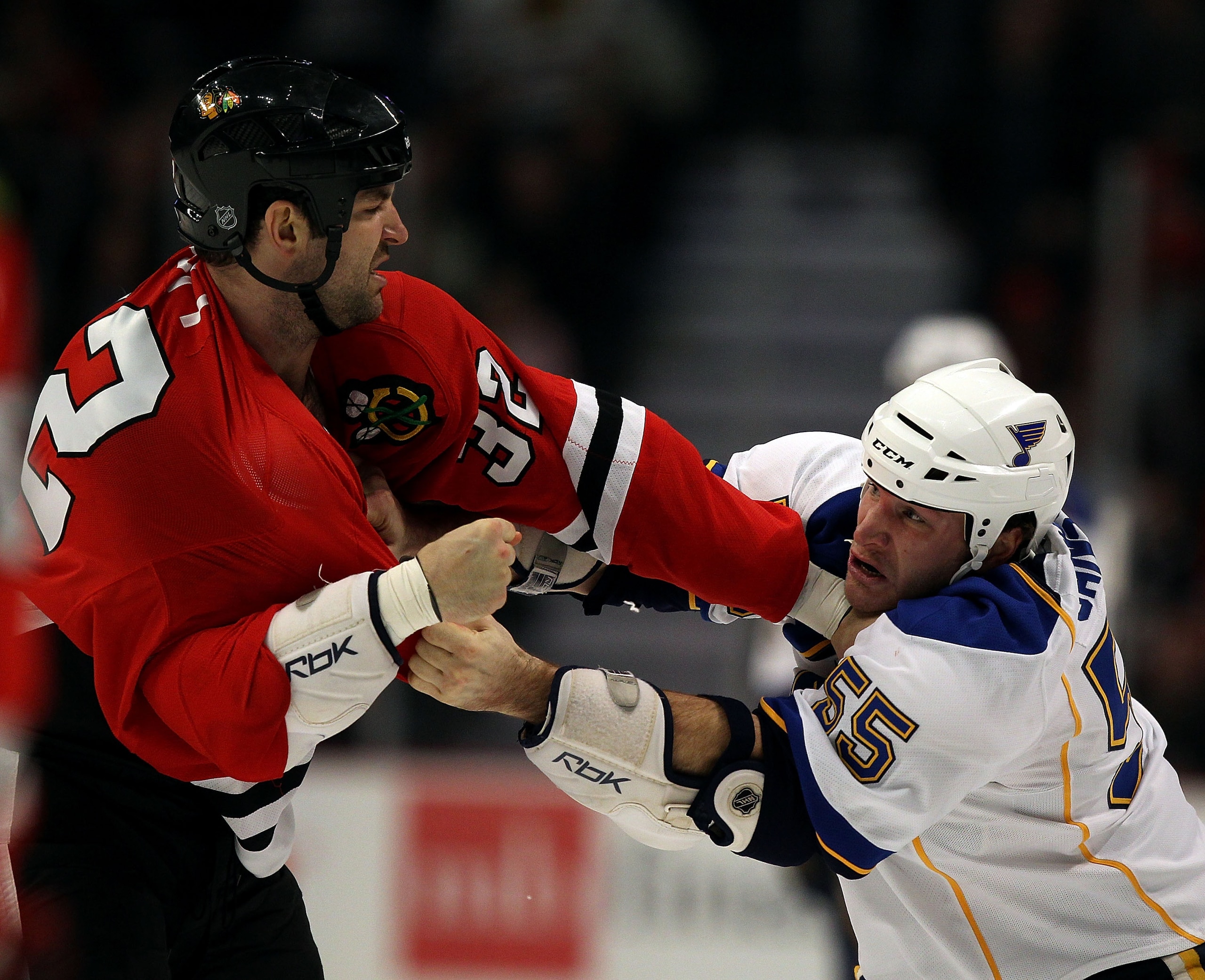 CHICAGO - NOVEMBER 30: John Scott #32 of the Chicago Blackhawks fights with Cam Janssen #55 of the St. Louis Blues at the United Center on November 30, 2010 in Chicago, Illinois. (Photo by Jonathan Daniel/Getty Images)