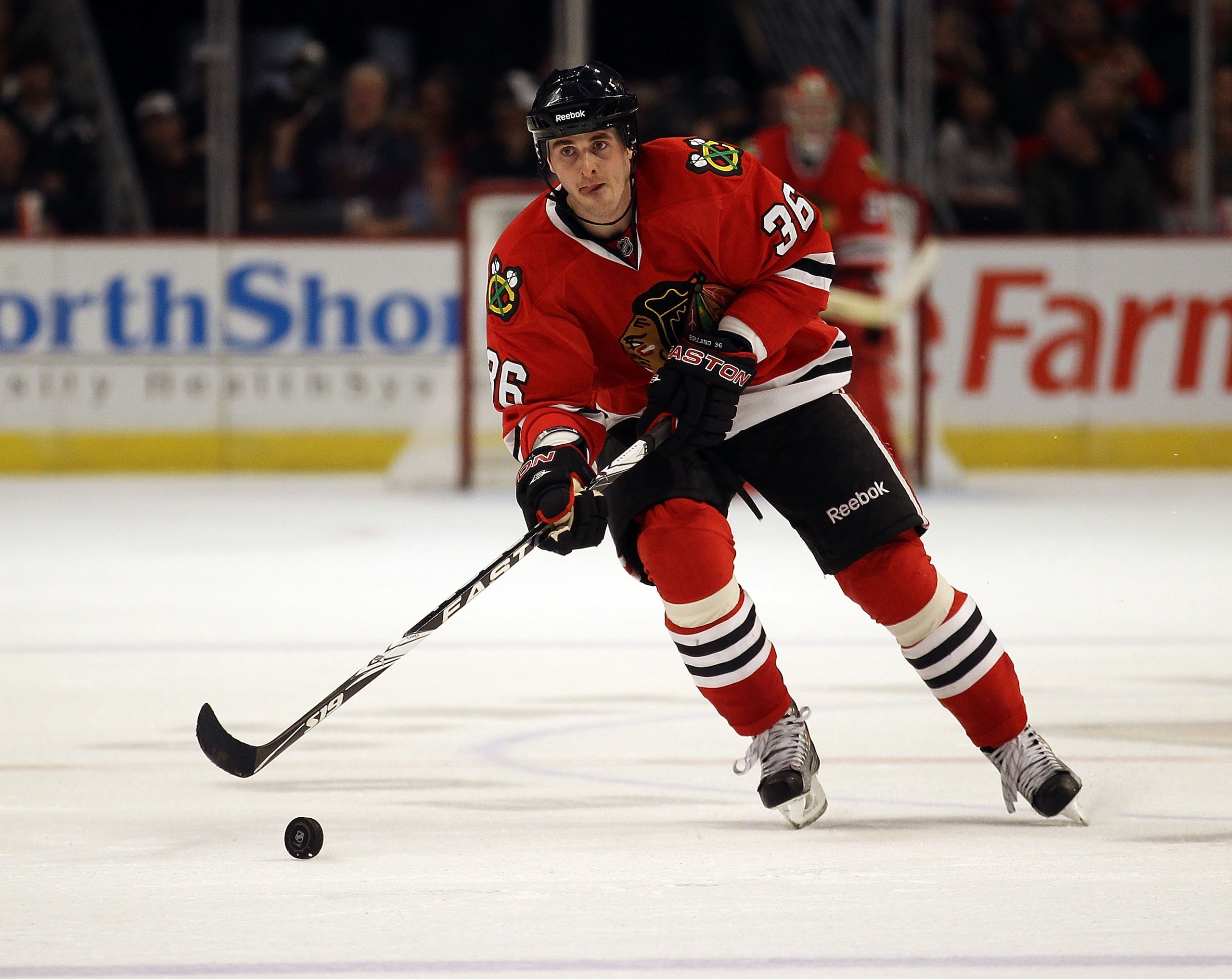 CHICAGO, IL - DECEMBER 30: Dave Bolland #36 of the Chicago Blackhawks skates up the ice against the San Jose Sharks at the United Center on December 30, 2010 in Chicago, Illinois. The Sharks defeated the Blackhawks 5-3. (Photo by Jonathan Daniel/Getty Ima