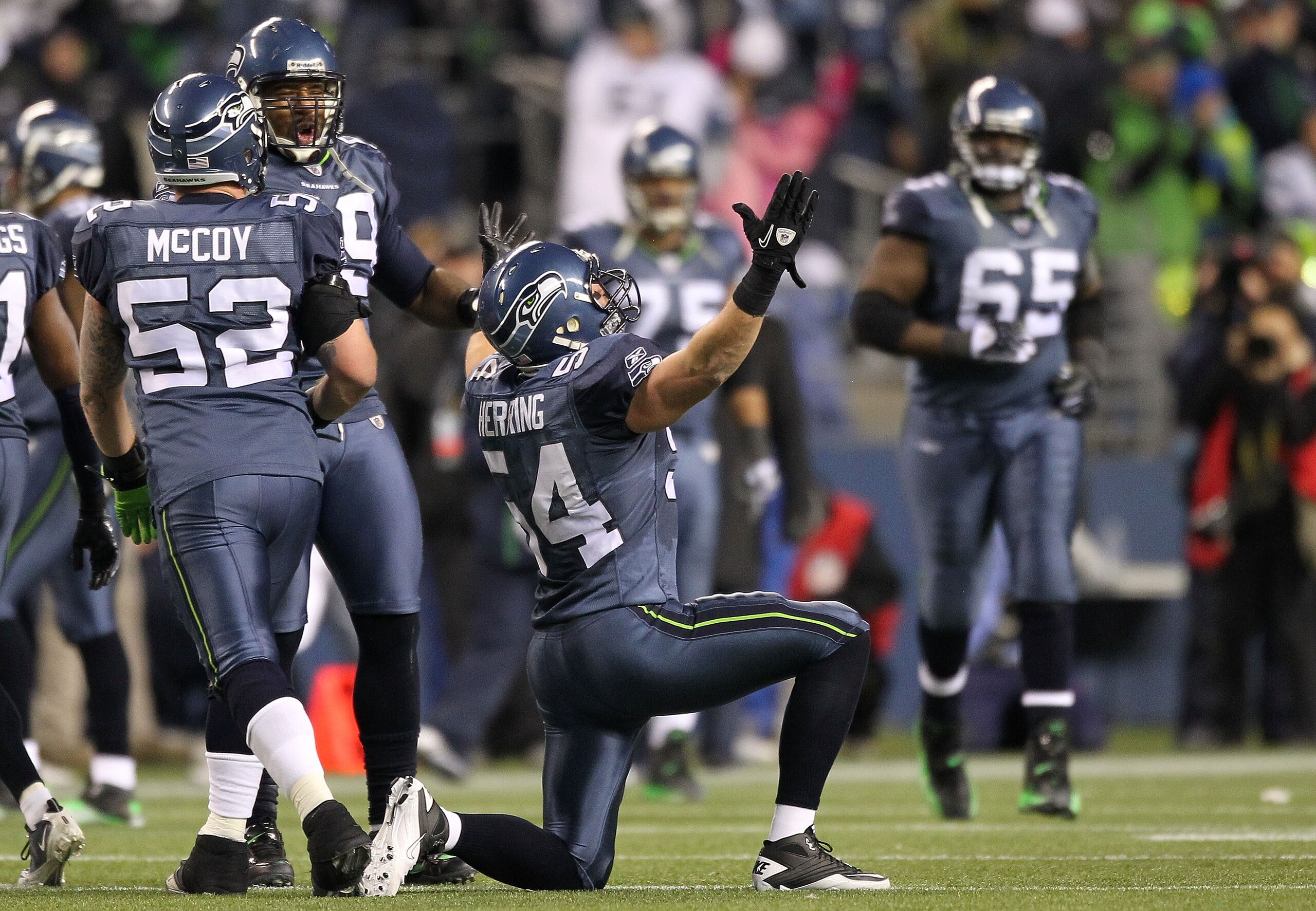 SEATTLE, WA - JANUARY 02:  Linebacker Will Herring #54 of the Seattle Seahawks celebrates an interception against the St. Louis Rams during the fourth quarter of their game at Qwest Field on January 2, 2011 in Seattle, Washington.  (Photo by Otto Greule J