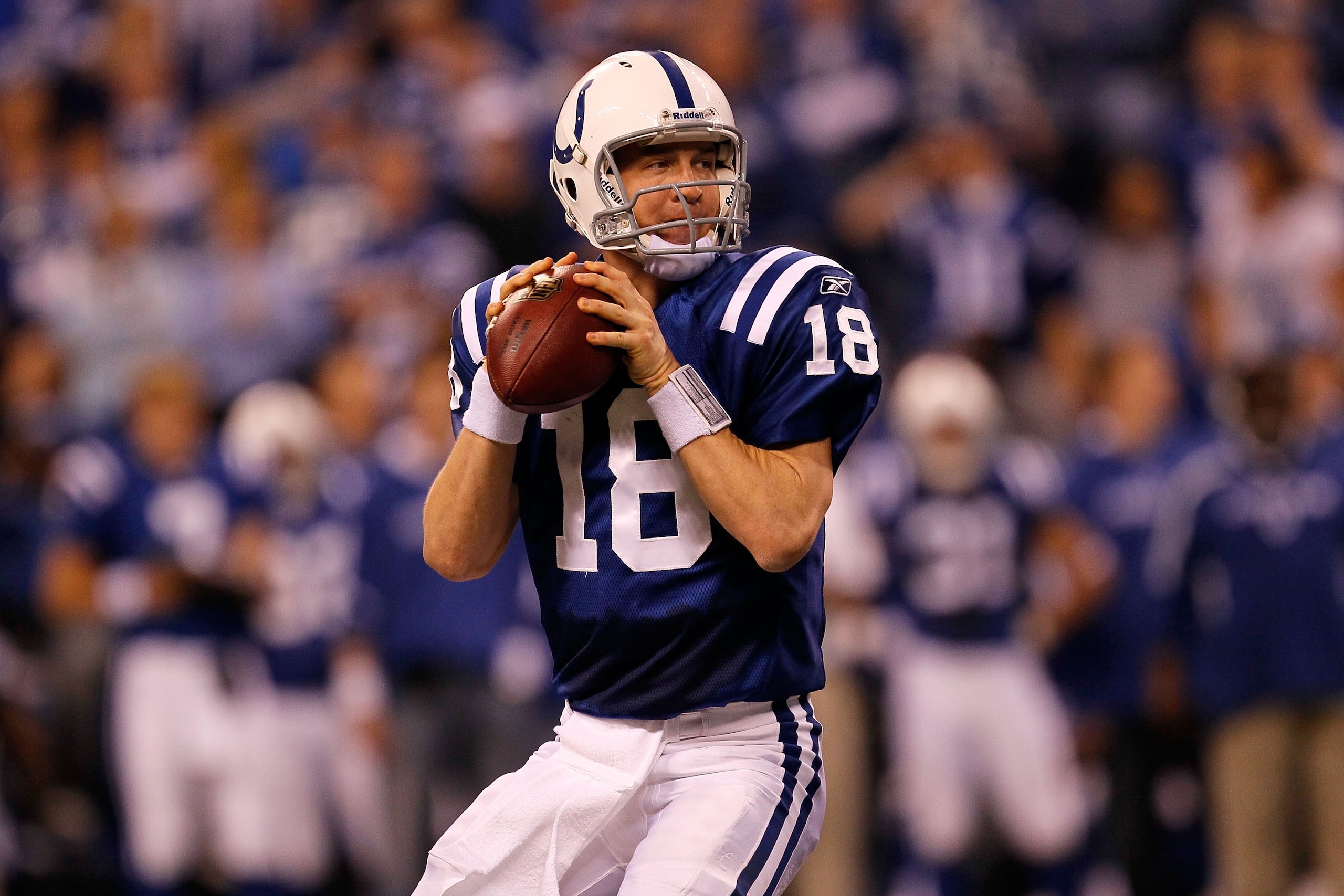 INDIANAPOLIS - JANUARY 24:  Quarterback Peyton Manning #18 of the Indianapolis Colts looks to pass  while playing against the New York Jets during the AFC Championship Game at Lucas Oil Stadium on January 24, 2010 in Indianapolis, Indiana. The Colts defea