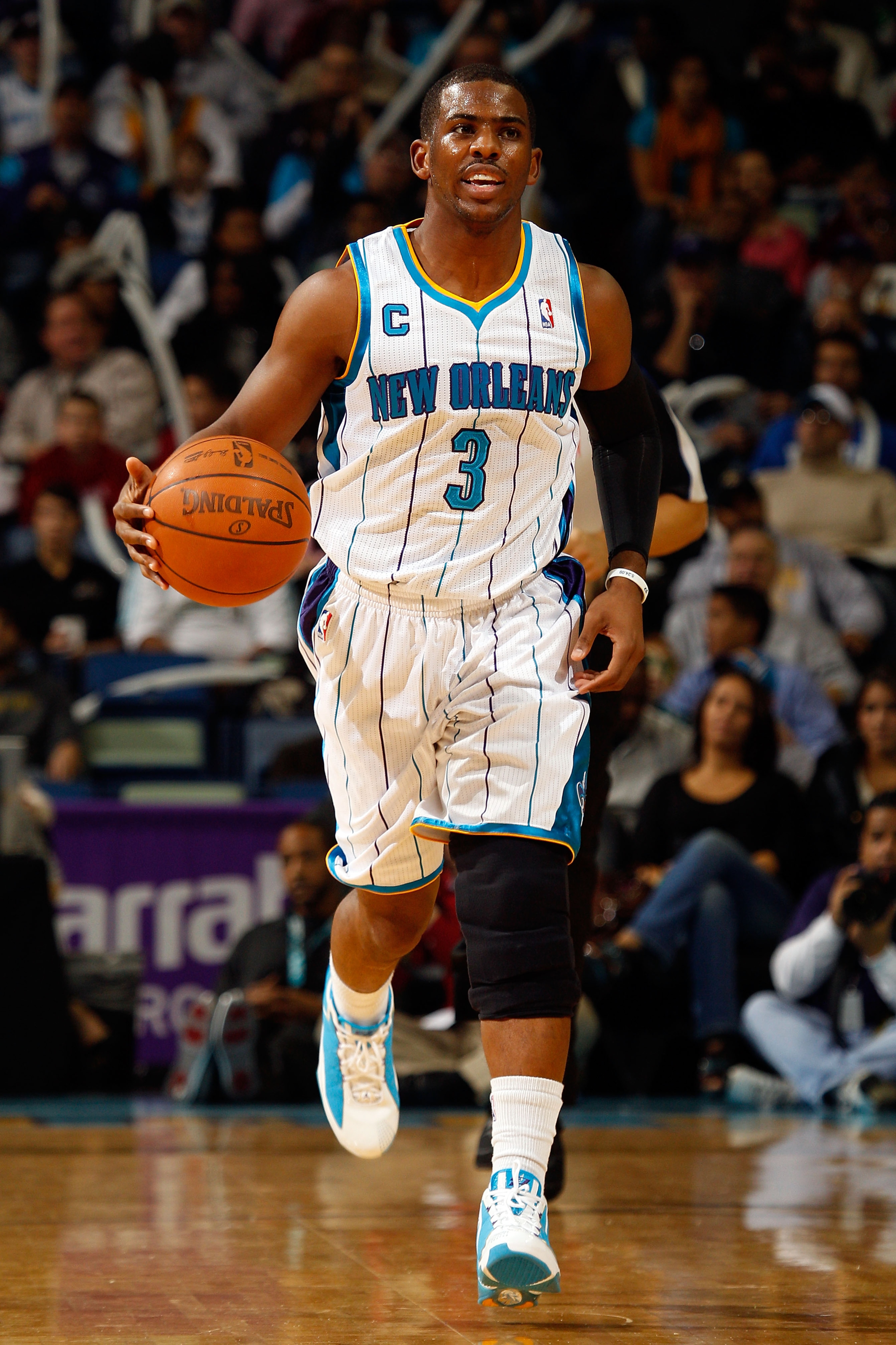 NEW ORLEANS, LA - JANUARY 03: Chris Paul #3 of the New Orleans Hornets moves the ball in the first half against the Philadelphia 76ers at New Orleans Arena on January 3, 2011 in New Orleans, Louisiana. NOTE TO USER: User expressly acknowledges and agrees NEW ORLEANS, LA - JANUARY 03: Chris Paul #3 of the New Orleans Hornets moves the ball in the first half against the Philadelphia 76ers at New Orleans Arena on January 3, 2011 in New Orleans, Louisiana. NOTE TO USER: User expressly acknowledges and agrees