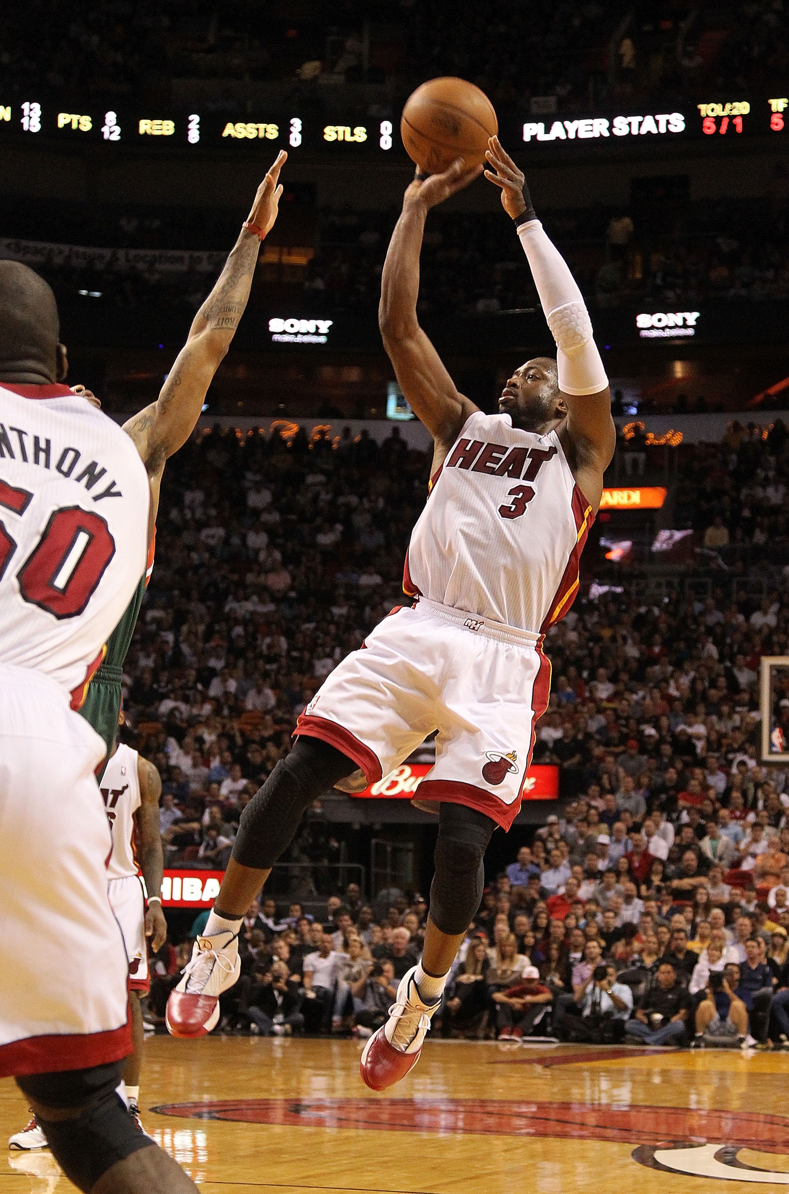 MIAMI, FL - JANUARY 04: Dwyane Wade #3 of the Miami Heat shoots during a game against the Milwaukee Bucks at American Airlines Arena on January 4, 2011 in Miami, Florida. NOTE TO USER: User expressly acknowledges and agrees that, by downloading and/or usi