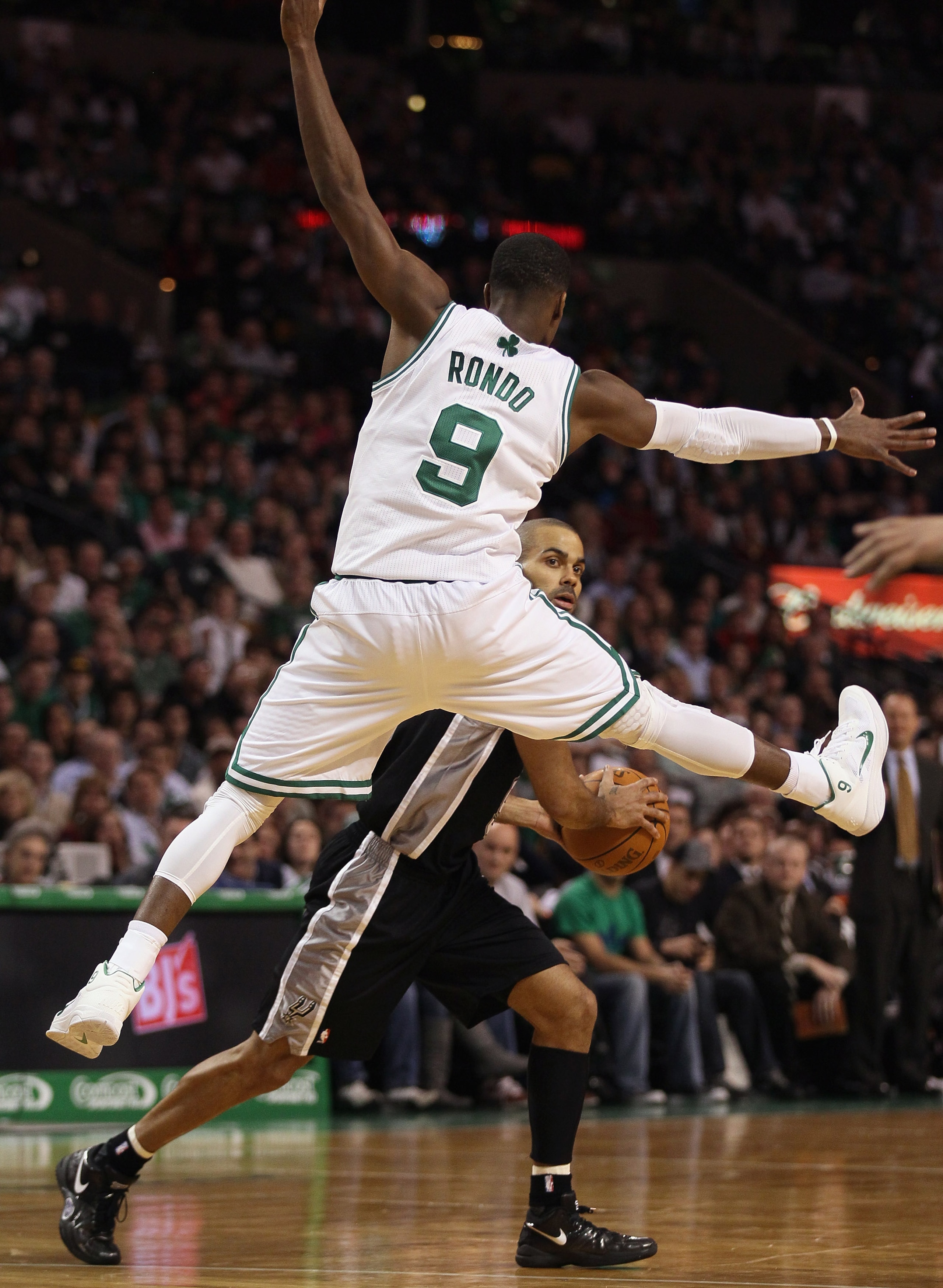 BOSTON, MA - JANUARY 05:  Tony Parker #9 of the San Antonio Spurs tries to pass around Rajon Rondo #9 of the Boston Celtics on January 5, 2011 at the TD Garden in Boston, Massachusetts. The Celtics defeated the Spurs 105-103. NOTE TO USER: User expressly