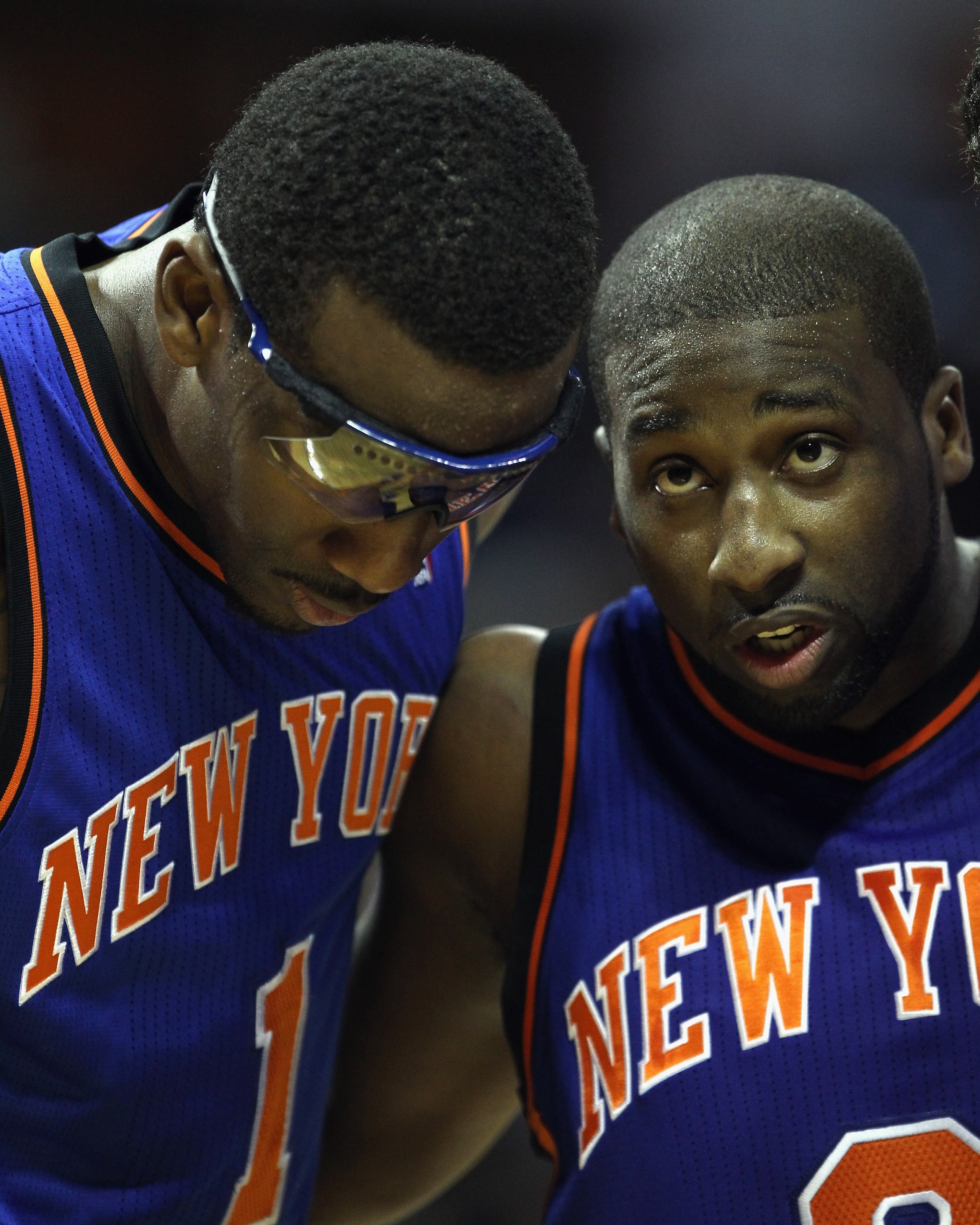 CHARLOTTE, NC - NOVEMBER 24:  Amare Stoudemire #1 of the New York Knicks and teammate Raymond Felton #2 huddle up against the Charlotte Bobcats at Time Warner Cable Arena on November 24, 2010 in Charlotte, North Carolina.  NOTE TO USER: User expressly ack