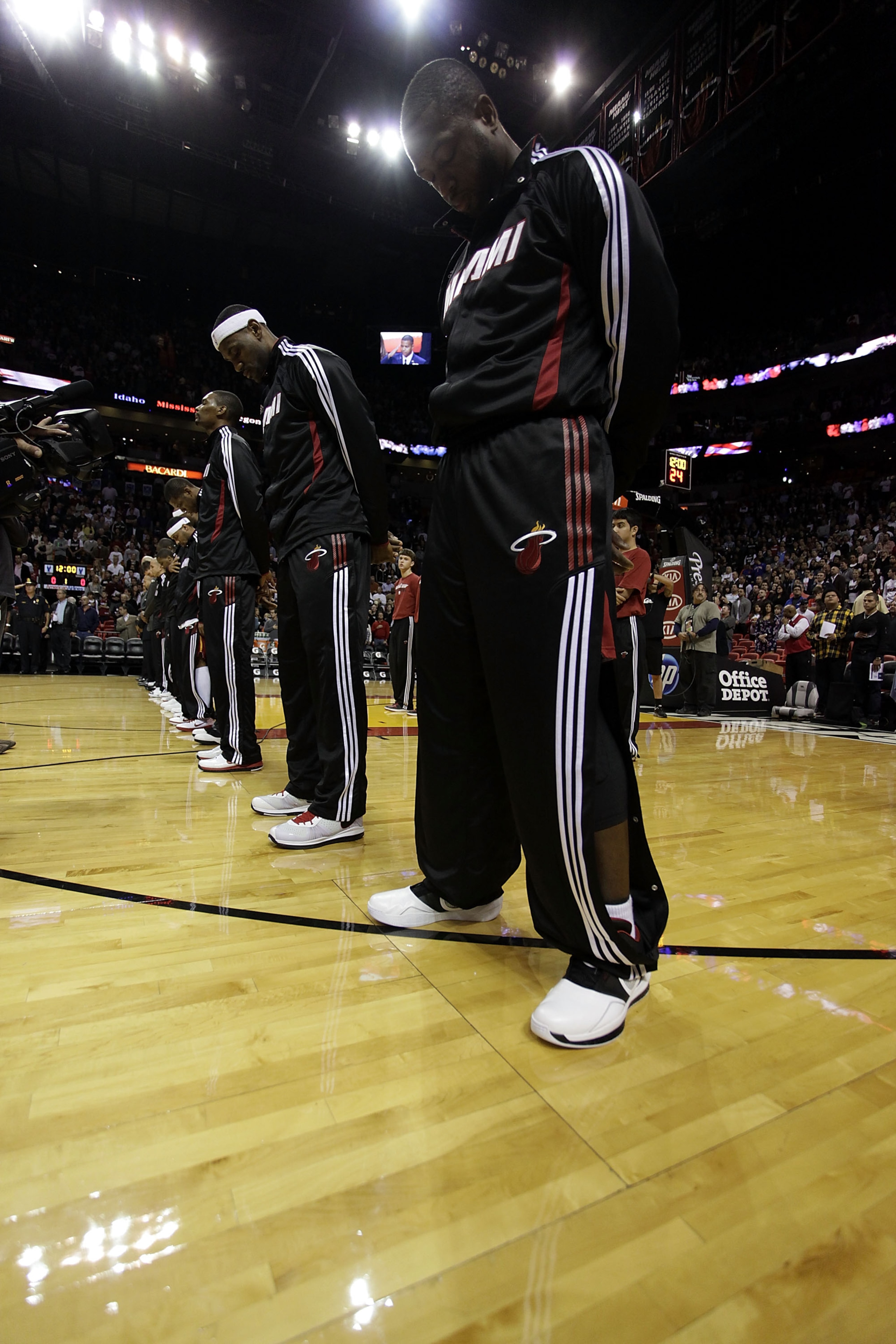 MIAMI - DECEMBER 28:  LeBron James #6, Dwyane Wade #3 and Chris Bosh #1  of the Miami Heat are introduced before a game against the New York Knicks at American Airlines Arena on December 28, 2010 in Miami, Florida.  (Photo by Marc Serota/Getty Images)