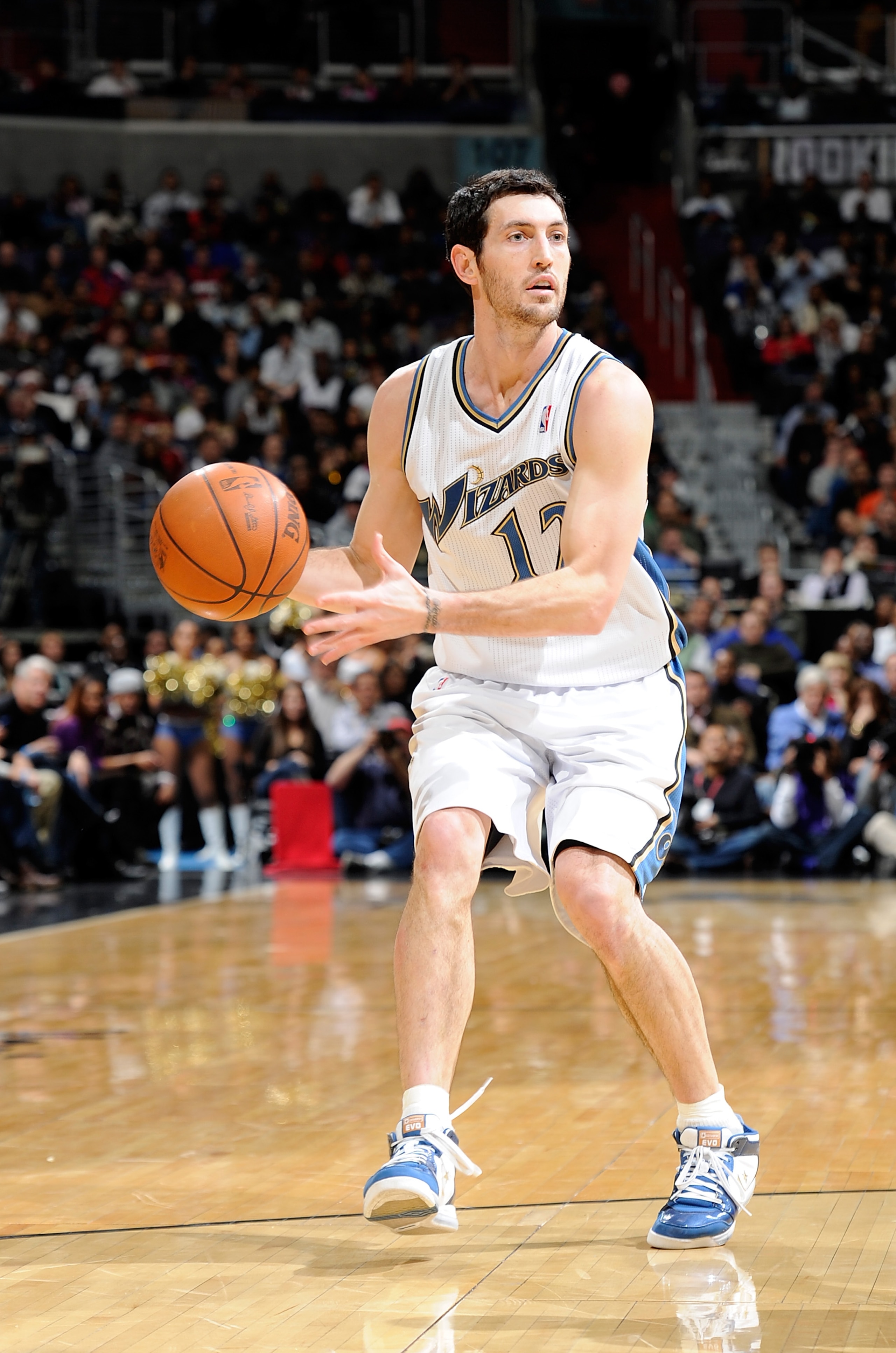 WASHINGTON, DC - DECEMBER 18:  Kirk Hinrich #12 of the Washington Wizards handles the ball against the Miami Heat at the Verizon Center on December 18, 2010 in Washington, DC. NOTE TO USER: User expressly acknowledges and agrees that, by downloading and o