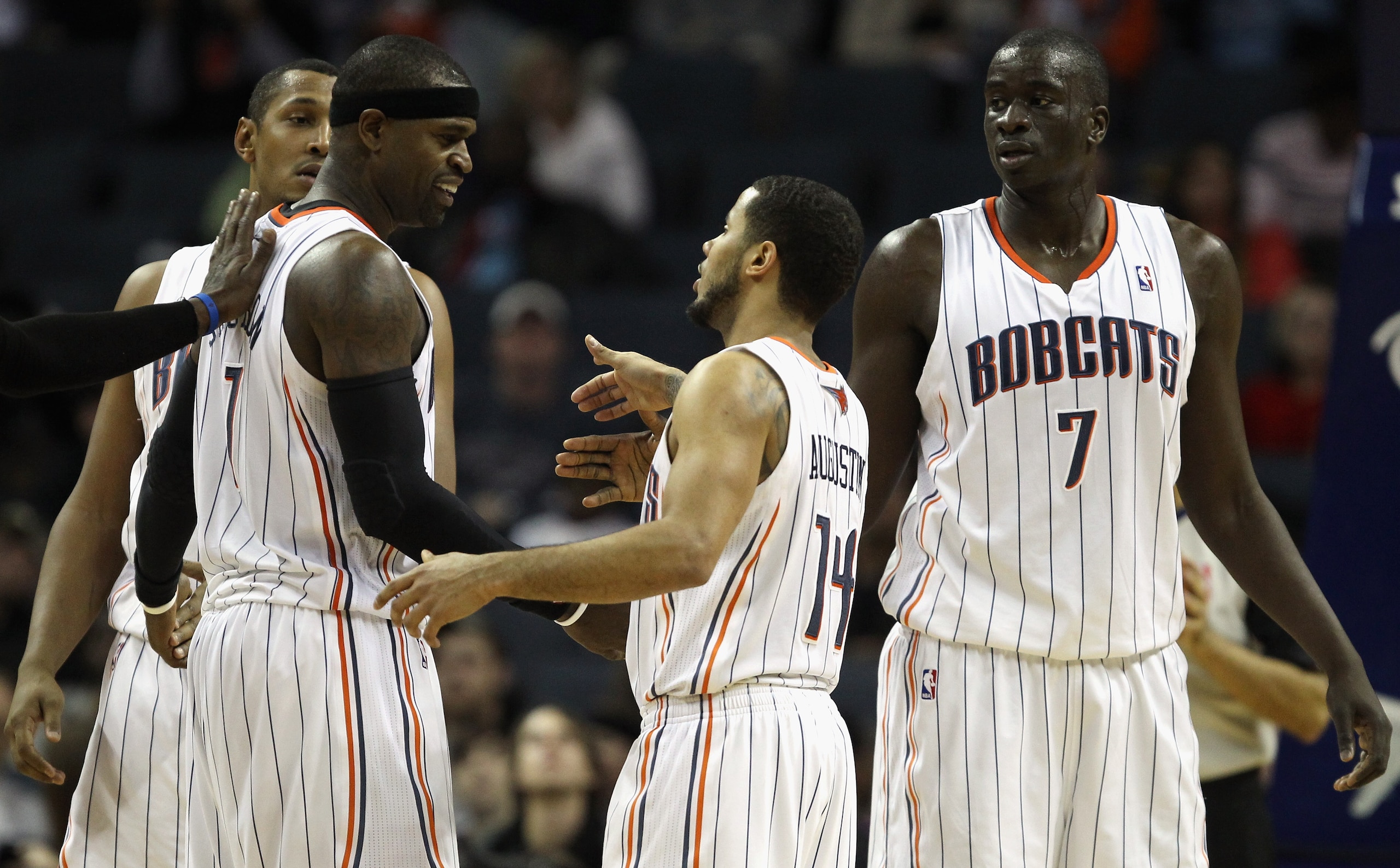 CHARLOTTE, NC - DECEMBER 29:  Teammates Stephen Jackson #1 and D.J. Augustin #14 of the Charlotte Bobcats react after a play during their game against the Cleveland Cavaliers at Time Warner Cable Arena on December 29, 2010 in Charlotte, North Carolina. NO