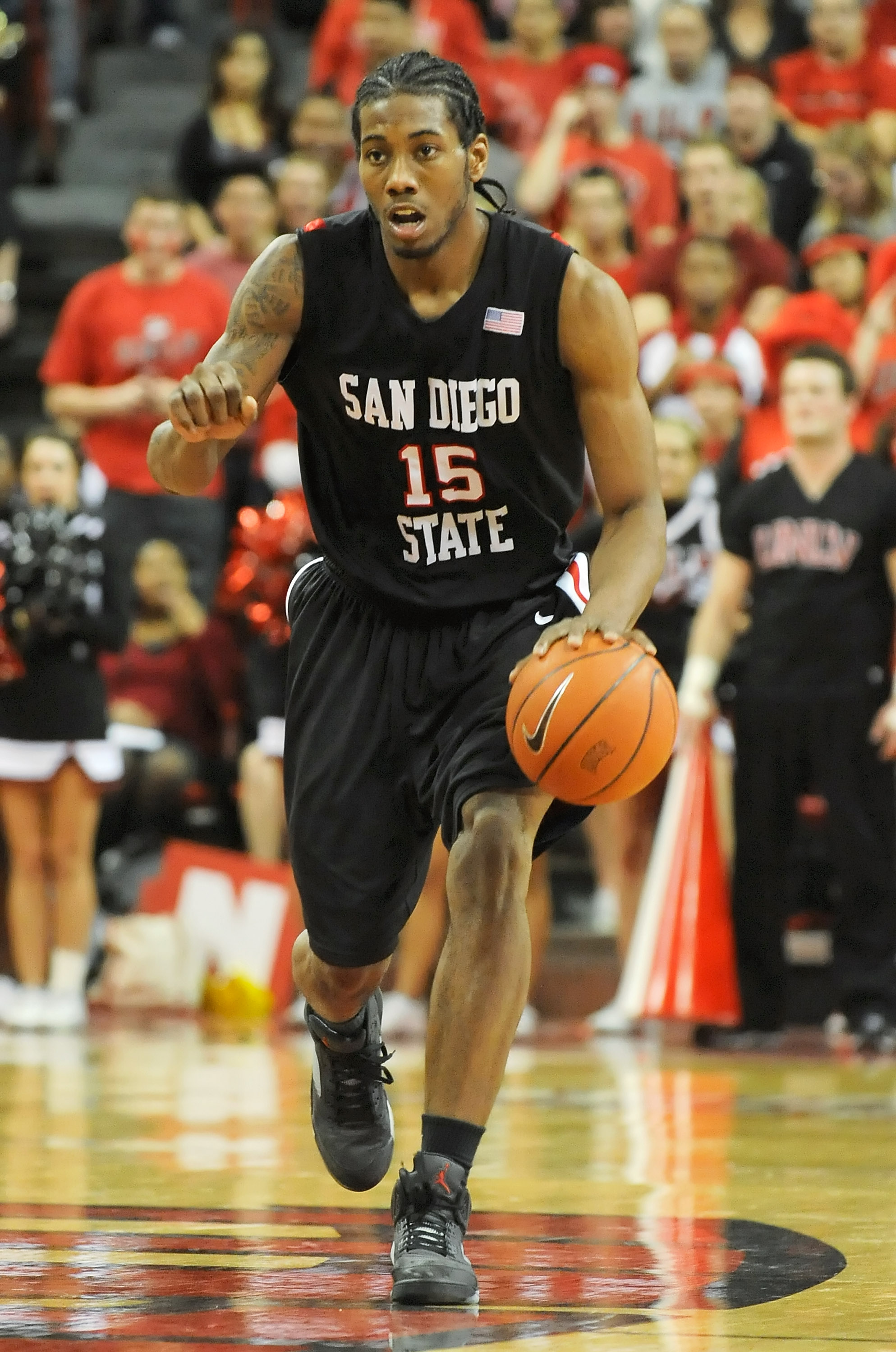 LAS VEGAS - JANUARY 13:  Kawhi Leonard #15 of the San Diego State Aztecs brings the ball up the court during a game against the UNLV Rebels at the Thomas & Mack Center January 13, 2009 in Las Vegas, Nevada. The Rebels defeated the Aztecs 76-66.  (Photo by