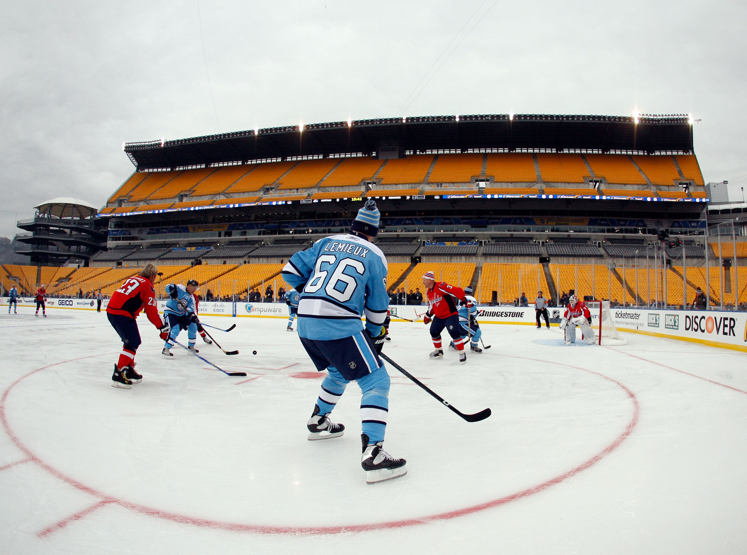 PITTSBURGH, PA - DECEMBER 31:  Mario Lemieux #66 of the Pittsburgh Penguins skates against the Washington Capitals during the 2011 NHL Winter Classic Alumni Game on December 31, 2010 at Heinz Field in Pittsburgh, Pennsylvania.  (Photo by Justin K. Aller/G