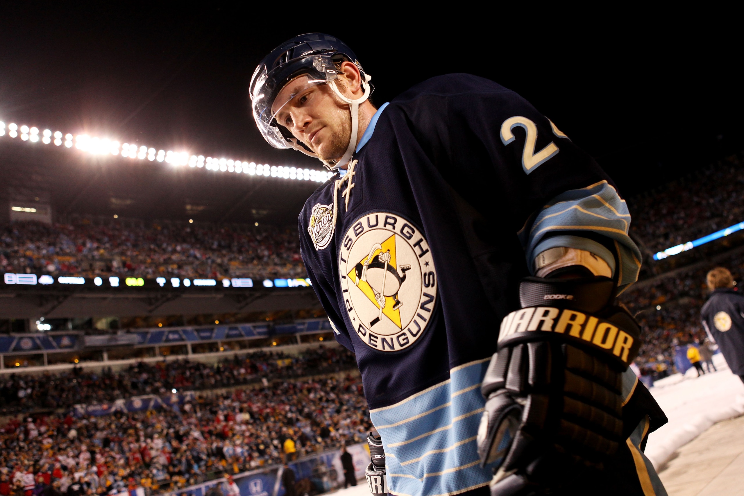 PITTSBURGH, PA - JANUARY 01:  Matt Cooke #24 of the Pittsburgh Penguins walks to the ice before playing against the Washington Capitals during the 2011 NHL Bridgestone Winter Classic at Heinz Field on January 1, 2011 in Pittsburgh, Pennsylvania. Washingto