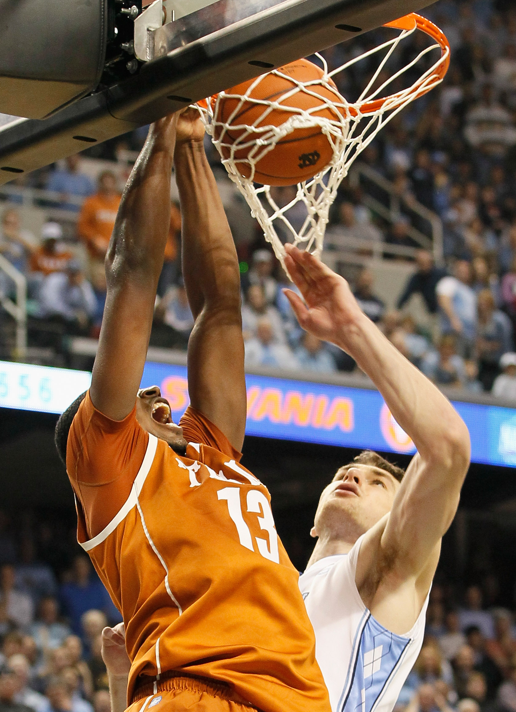 GREENSBORO, NC - DECEMBER 18:  Tristan Thompson #13 of the Texas Longhorns dunks against Tyler Zeller #44 of the North Carolina Tar Heels at Greensboro Coliseum on December 18, 2010 in Greensboro, North Carolina.  (Photo by Kevin C. Cox/Getty Images)