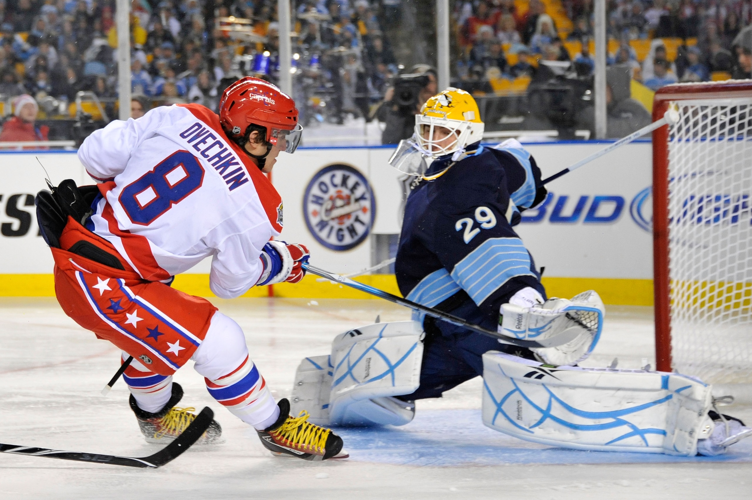 PITTSBURGH, PA - JANUARY 01:  Alex Ovechkin #8 of the Washington Capitals shoots against Marc-Andre Fleury #29 of the Pittsburgh Penguins during the 2011 NHL Bridgestone Winter Classic at Heinz Field on January 1, 2011 in Pittsburgh, Pennsylvania.  (Photo