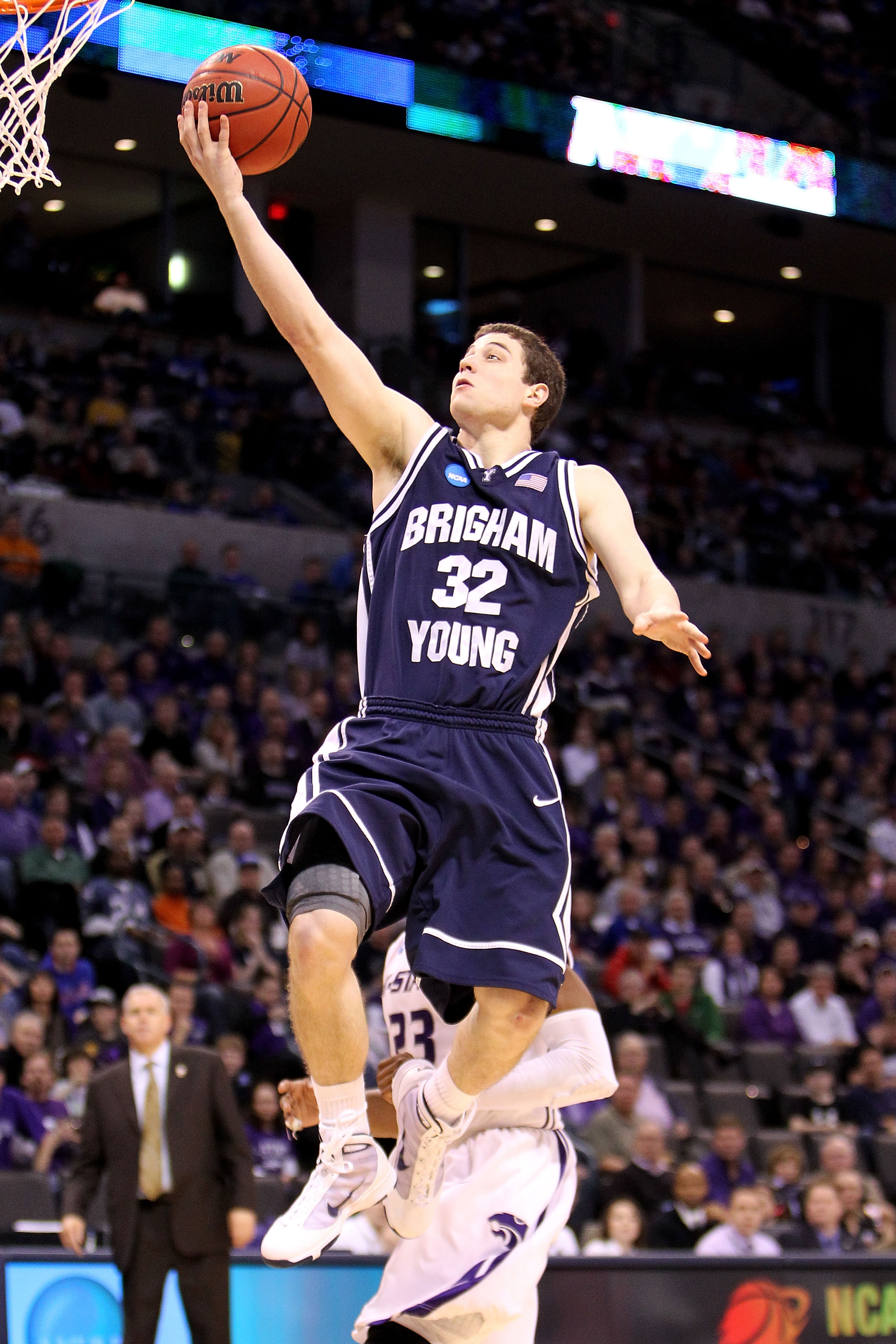 OKLAHOMA CITY - MARCH 20:  Jimmer Fredette #32 of the Brigham Young Cougars drives for a shot attempt against the Kansas State Wildcats during the second round of the 2010 NCAA men's basketball tournament at Ford Center on March 20, 2010 in Oklahoma City,
