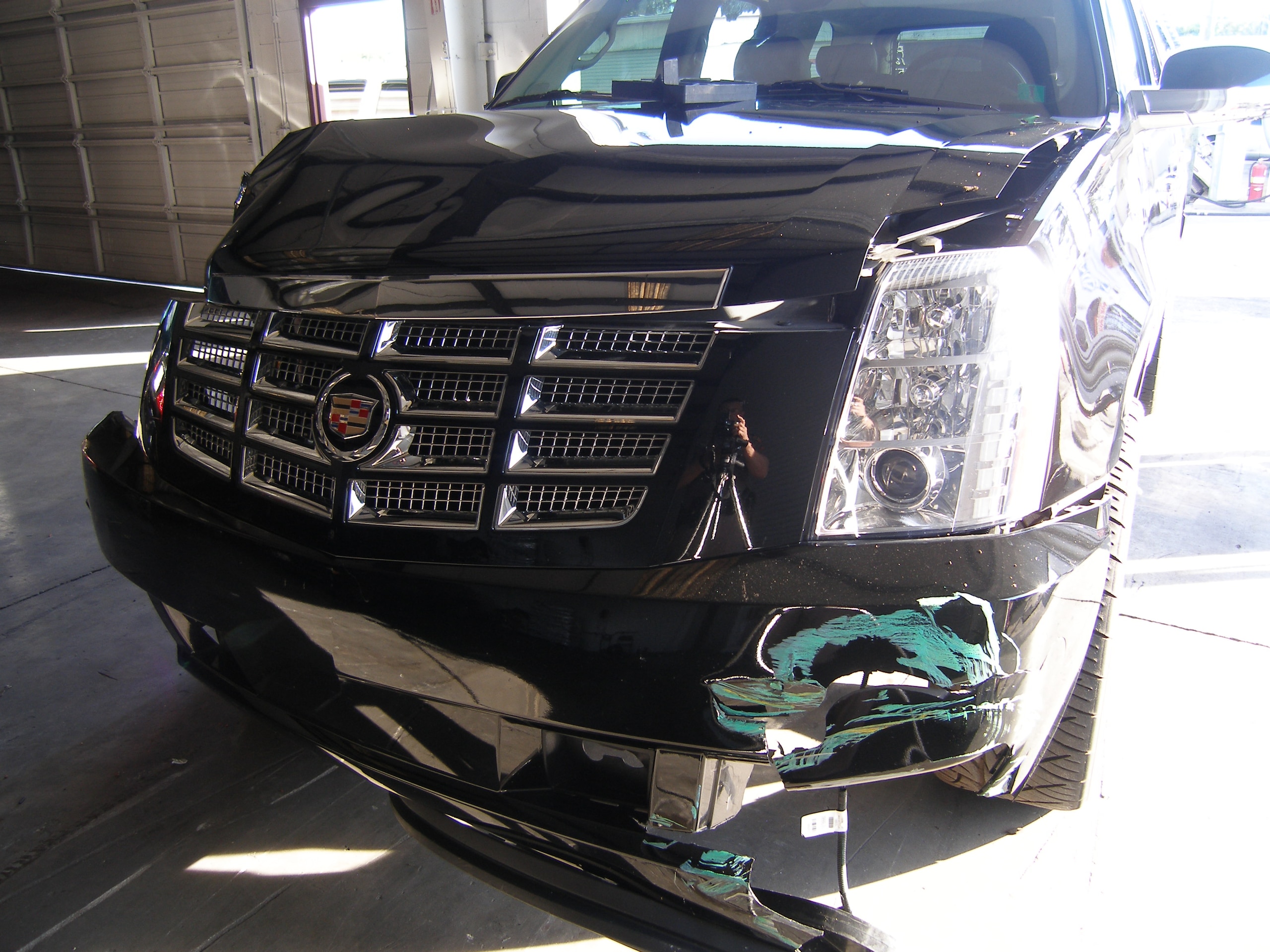 ORLANDO, FL - DECEMBER 02:  In this handout photo provided by The Florida Highway Patrol, the vehicle driven by Tiger Woods during his accident is seen on December 2, 2009 in Orlando, Florida. Woods crashed the SUV into the fire hydrant and tree next to h