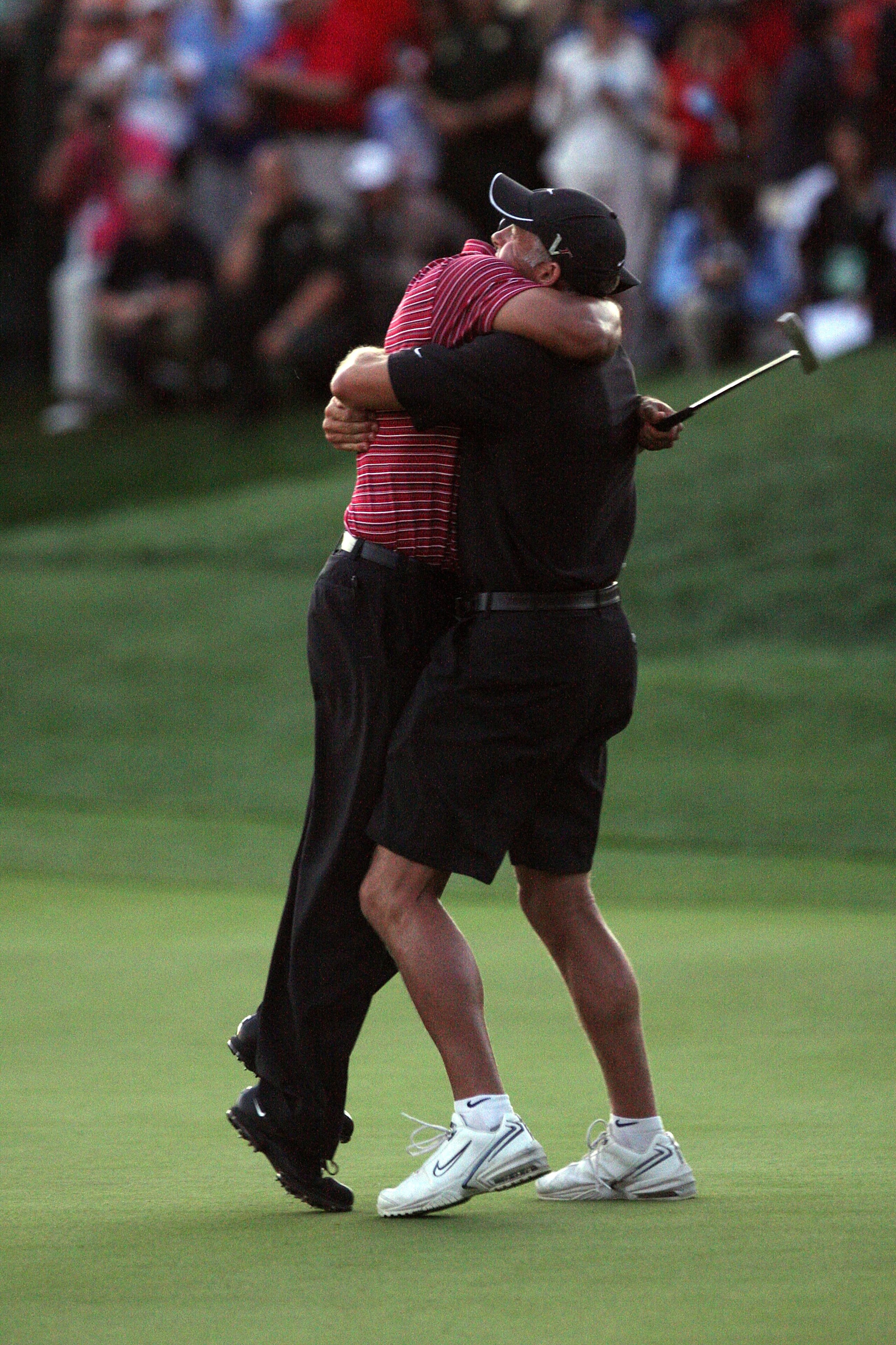 ORLANDO, FL - MARCH 29:  Tiger Woods of the USA holes for a winning birdie at the 18th hole during the final round of the Arnold Palmer Invitational Presented by Mastercard at the Bay Hill Club and Lodge on March 29, 2009 in Orlando, Florida  (Photo by Da