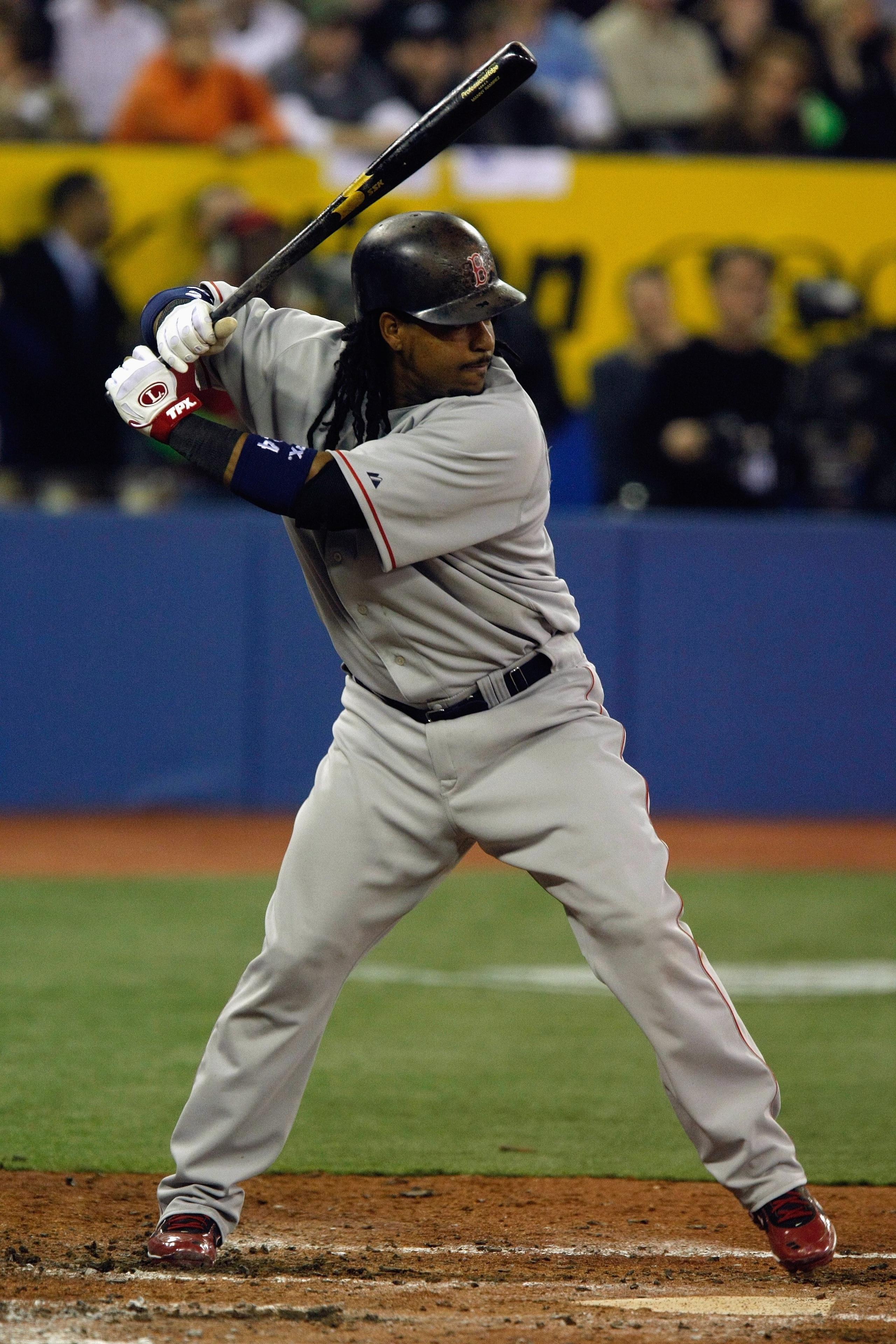 TORONTO - APRIL 4:  Manny Ramirez #24 of the Boston Red Sox bats against the Toronto Blue Jays during the game at Rogers Centre on April 4, 2008 in Toronto, Ontario. (Photo by Dave Sandford/Getty Images)
