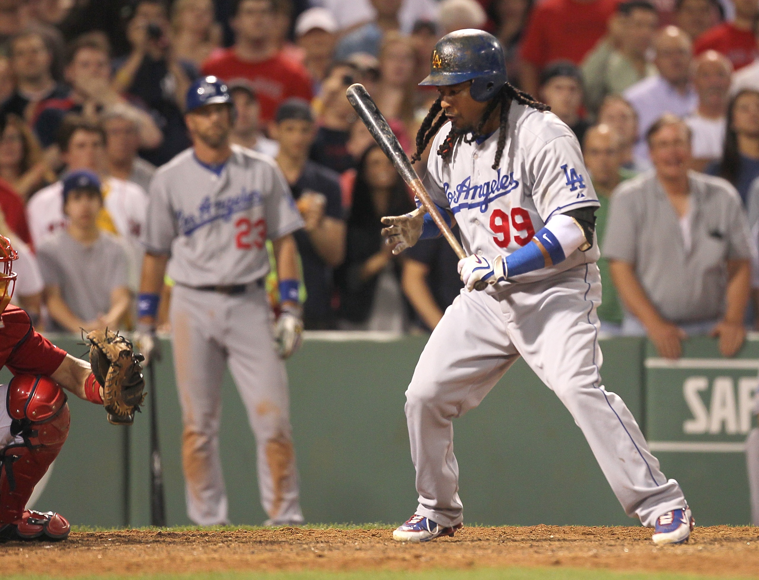 BOSTON - JUNE 18:  Manny Ramirez #99 of the Los Angeles Dodgers strikes out looking in the ninth inning with two men on base against the Boston Red Sox at Fenway Park on June 18, 2010 in Boston, Massachusetts. (Photo by Jim Rogash/Getty Images)