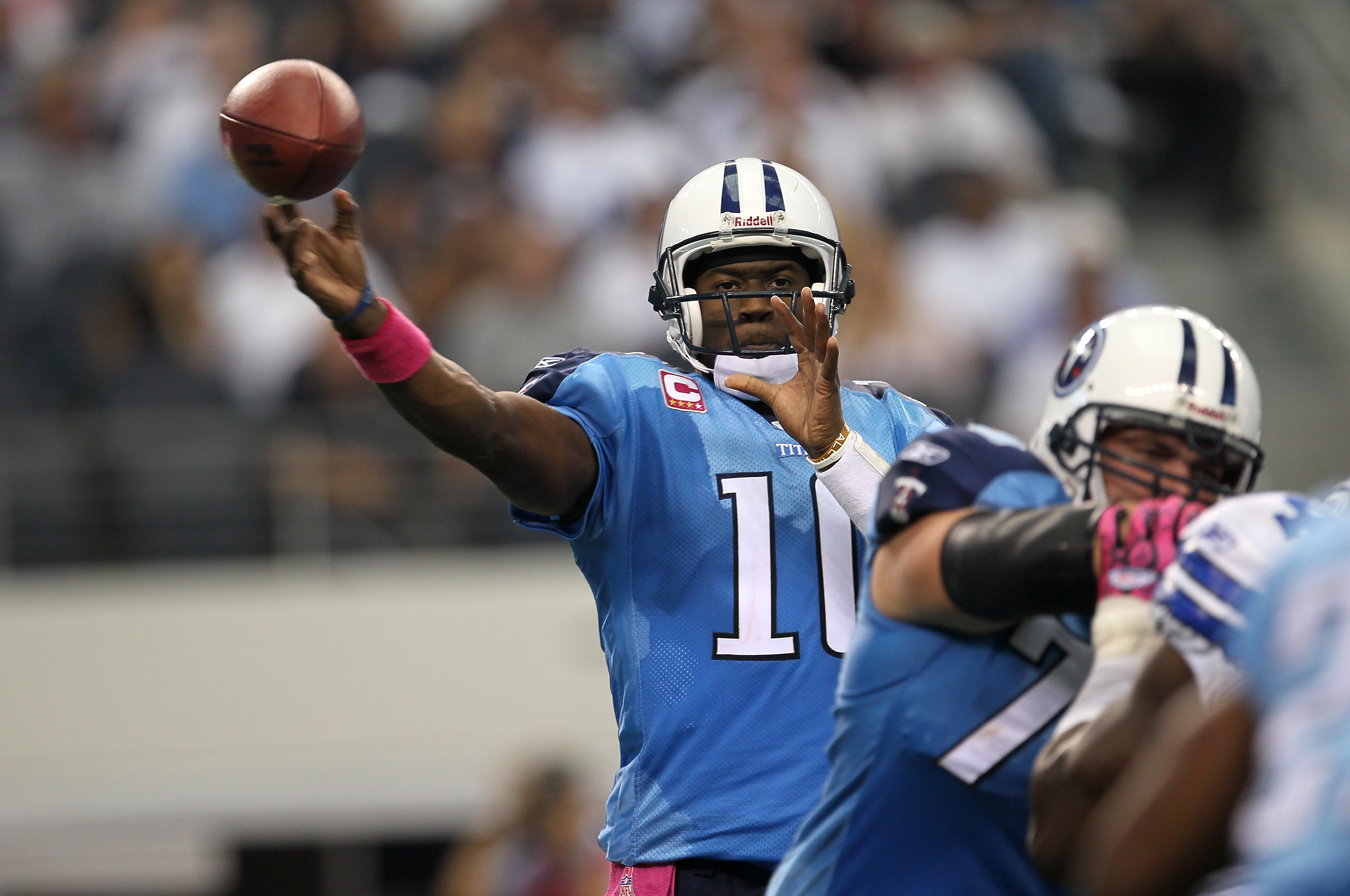 ARLINGTON, TX - OCTOBER 10:  Quarteback Vince Young #10 of the Tennessee Titans throws a pass against the Dallas Cowboys at Cowboys Stadium on October 10, 2010 in Arlington, Texas.  (Photo by Stephen Dunn/Getty Images)