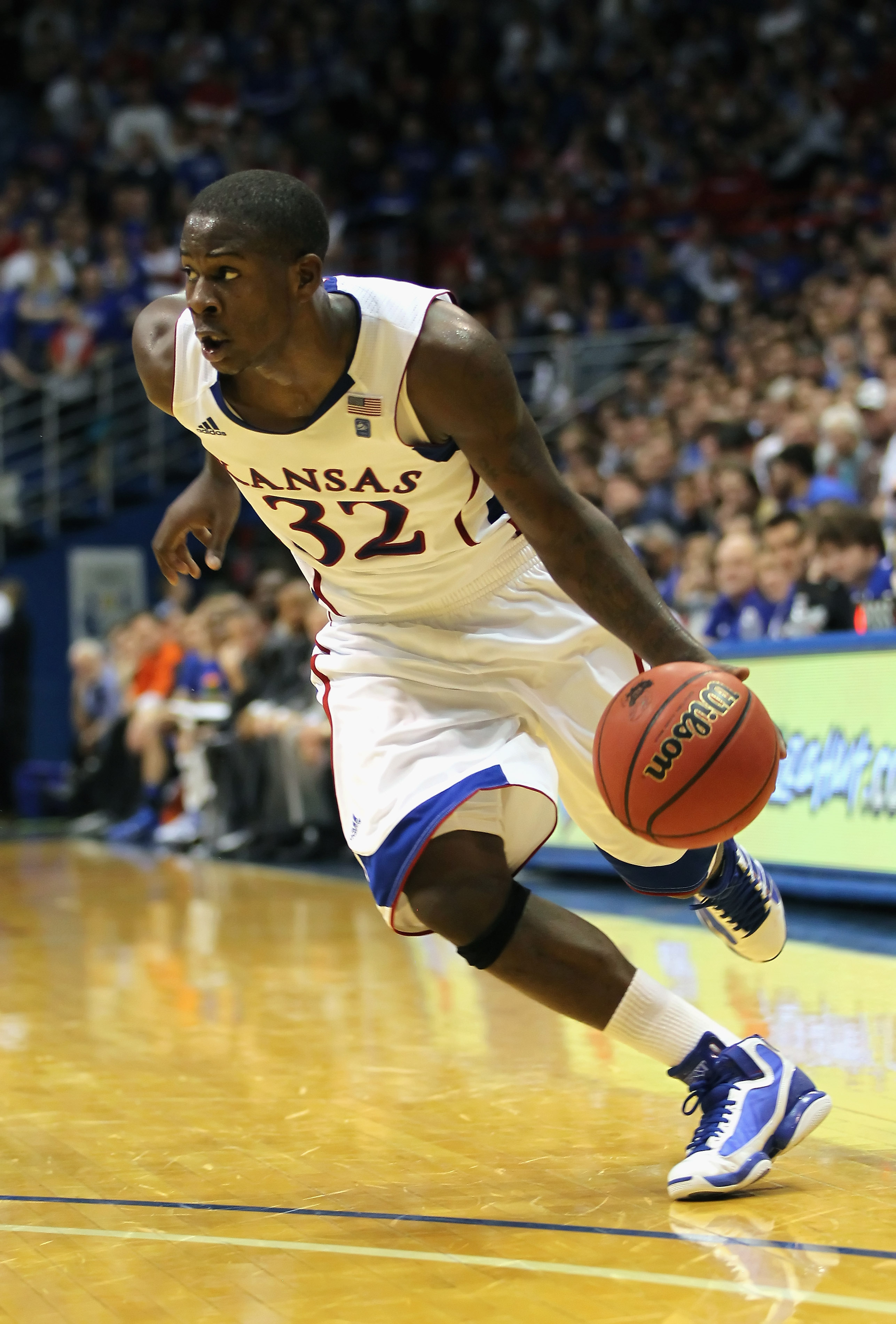 LAWRENCE, KS - DECEMBER 29:  Josh Selby #32 of the Kansas Jayhawks in action during the game against the University of Texas Arlington Mavericks on December 29, 2010 at Allen Fieldhouse in Lawrence, Kansas.  (Photo by Jamie Squire/Getty Images)