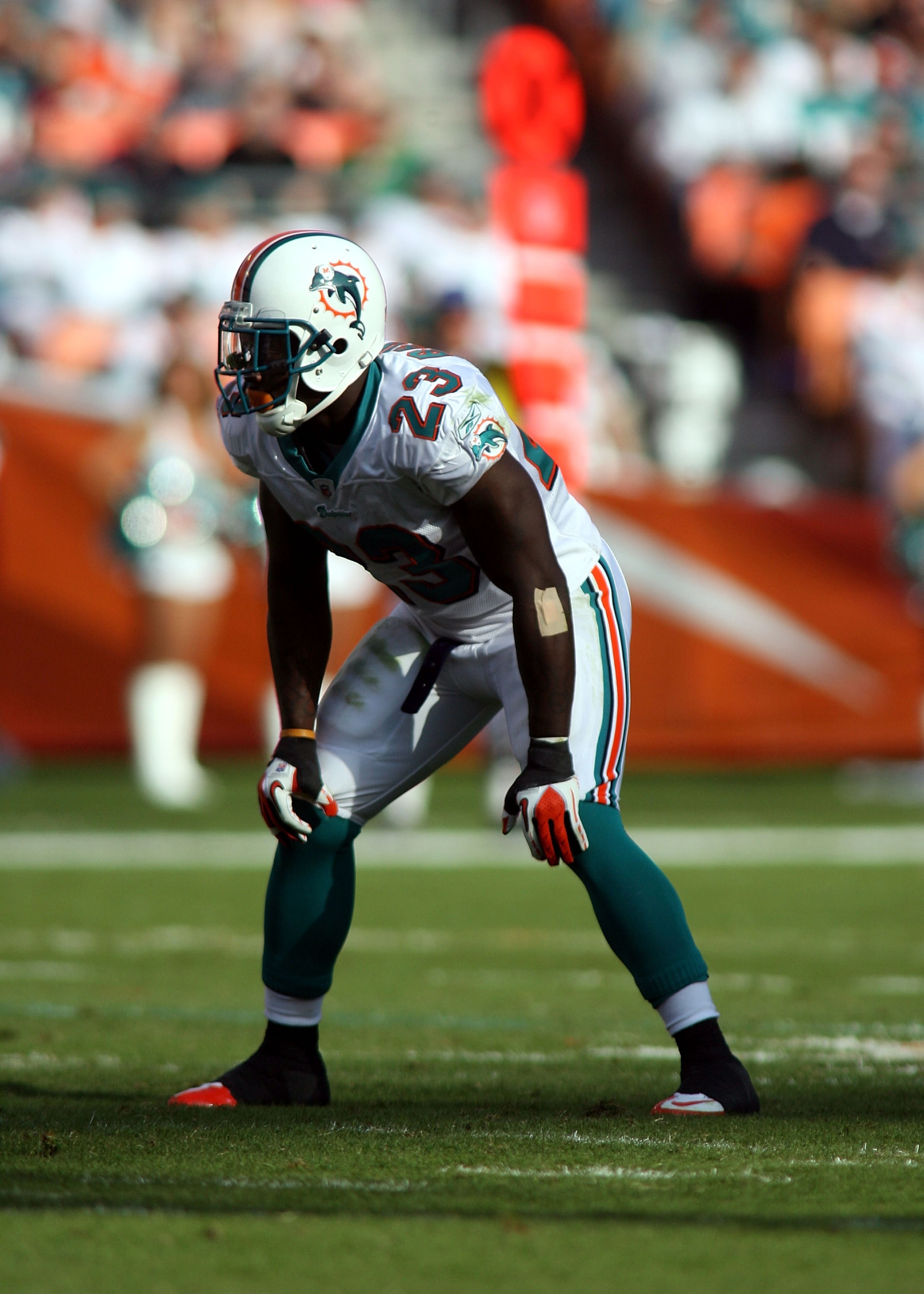 MIAMI - DECEMBER 19:  Running back Ronnie Brown #23 of the Miami Dolphins is upended by the Buffalo Bills at Sun Life Stadium on December 19, 2010 in Miami, Florida.  (Photo by Marc Serota/Getty Images)