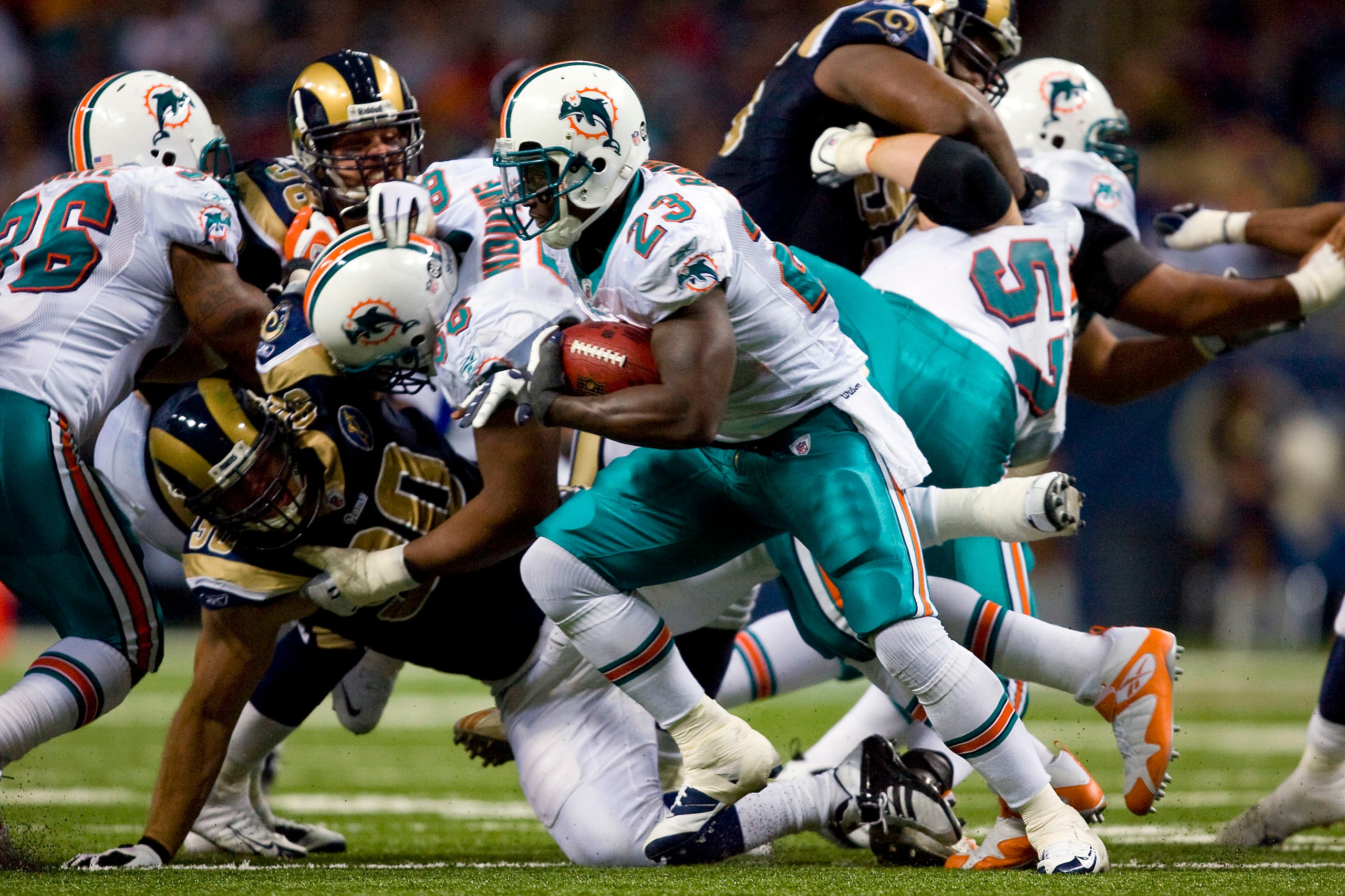 ST. LOUIS, MO. - NOVEMBER 30:  Ronnie Brown #23 of the Miami Dolphins rushes against the St. Louis Rams at the Edward Jones Dome on November 30, 2008 in St. Louis, Missouri.  The Dolphins beat the Rams 16-12.  (Photo by Dilip Vishwanat/Getty Images)