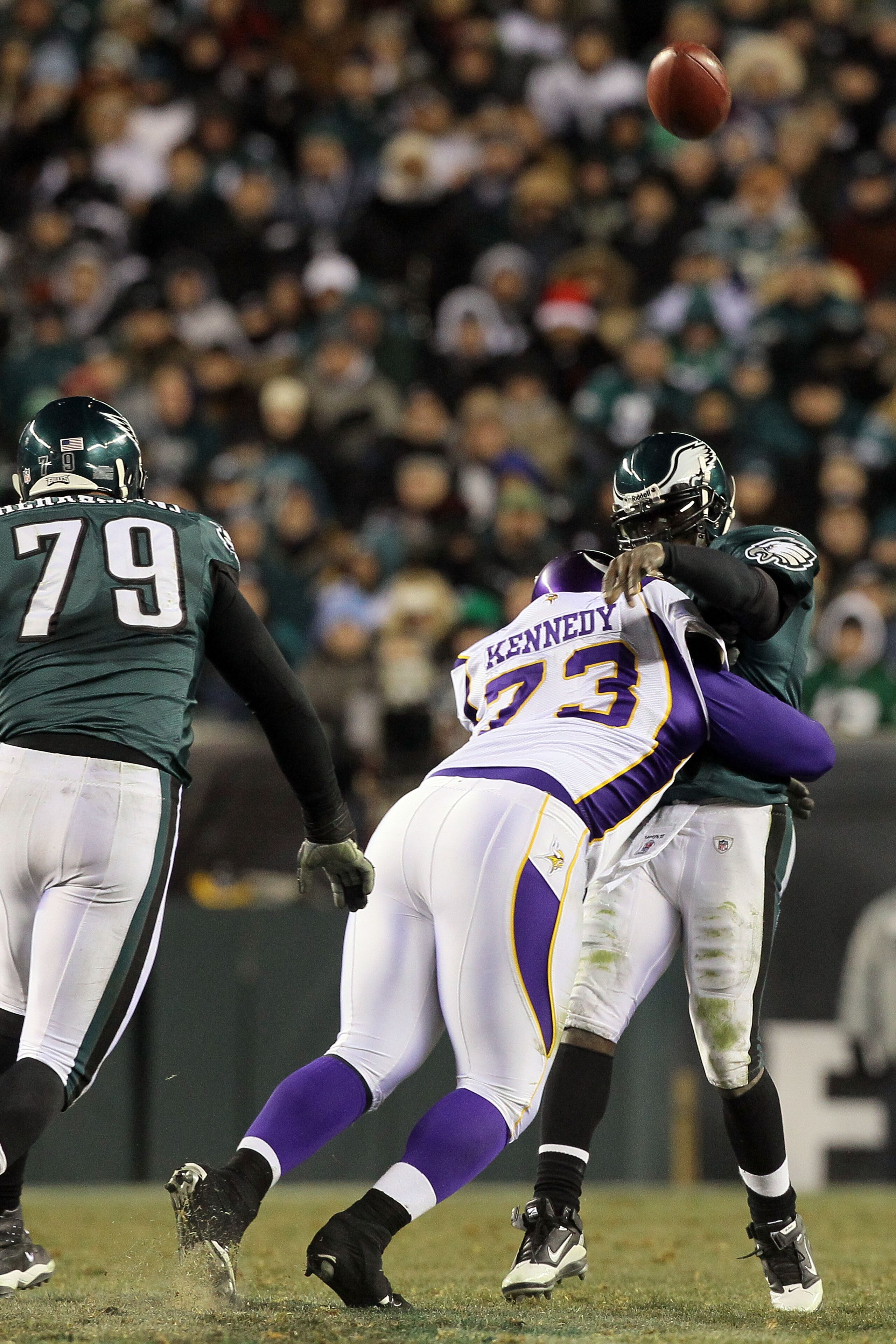 PHILADELPHIA, PA - DECEMBER 28:  Michael Vick #7 of the Philadelphia Eagles in action against Jimmy Kennedy #73 of the Minnesota Vikings at Lincoln Financial Field on December 26, 2010 in Philadelphia, Pennsylvania.  (Photo by Jim McIsaac/Getty Images)