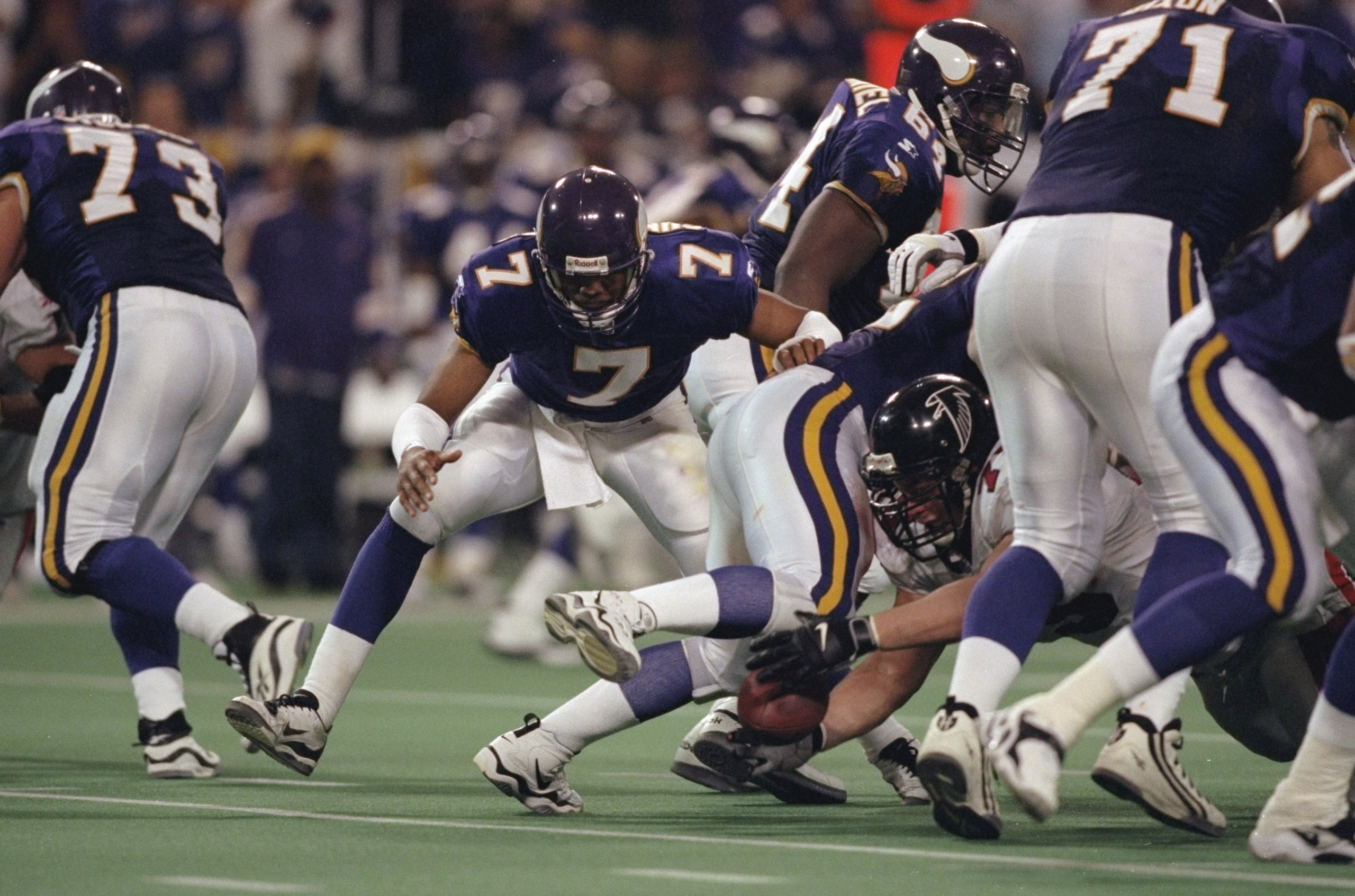 17 Jan 1999:  Shane Dronett #75 of the Atlanta Falcons dives on a fumble from Quarterback Randall Cunningham #7 during the NFC Championship Game against the Minnesota Vikings at the H. H. H. Metrodome in Minneapolis, Minnesota. The Falcons defeated the Vi