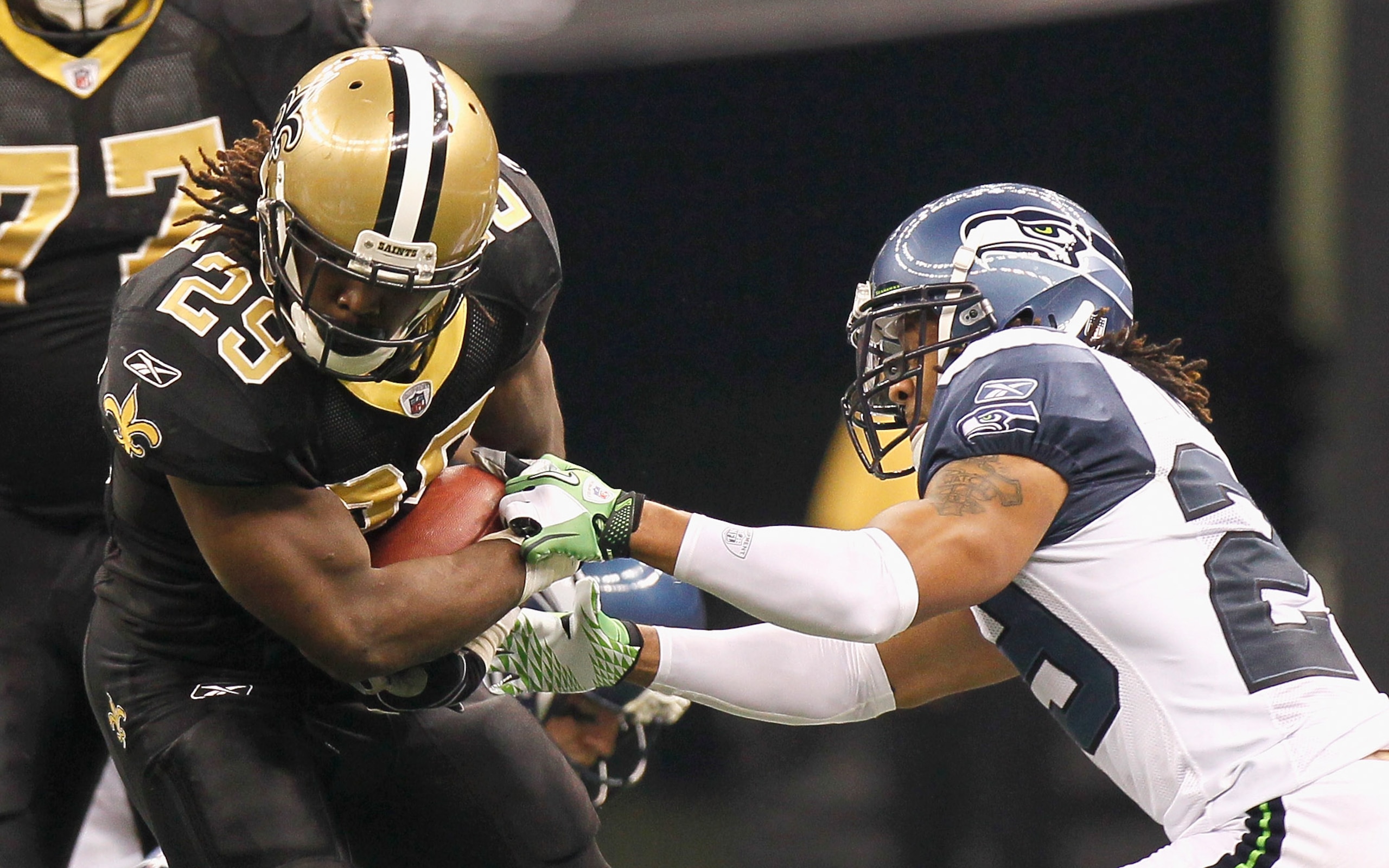NEW ORLEANS - NOVEMBER 21: Earl Thomas #29 of the Seattle Seahawks tries to strip the ball from Chris Ivory #29 of the New Orleans Saints at Louisiana Superdome on November 21, 2010 in New Orleans, Louisiana. (Photo by Kevin C. Cox/Getty Images) NEW ORLEANS - NOVEMBER 21: Earl Thomas #29 of the Seattle Seahawks tries to strip the ball from Chris Ivory #29 of the New Orleans Saints at Louisiana Superdome on November 21, 2010 in New Orleans, Louisiana. (Photo by Kevin C. Cox/Getty Images)