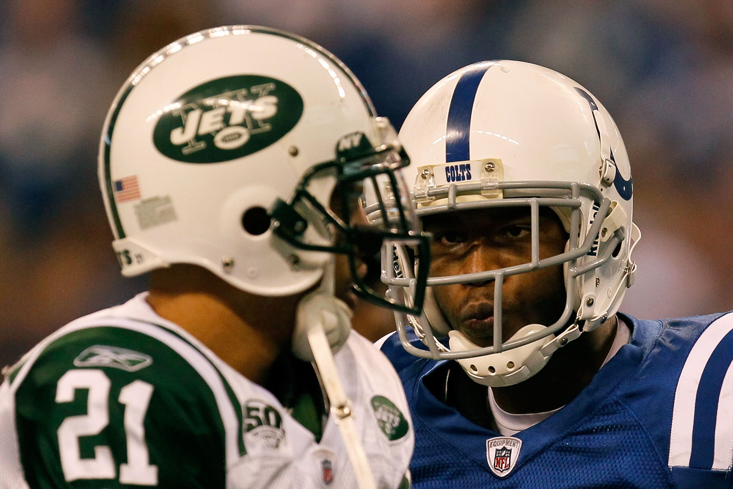 INDIANAPOLIS - JANUARY 24:  Wide receiver Pierre Garcon #85 of the Indianapolis Colts looks at Dwight Lowery #21 of the New York Jets during the AFC Championship Game at Lucas Oil Stadium on January 24, 2010 in Indianapolis, Indiana.  (Photo by Jonathan D
